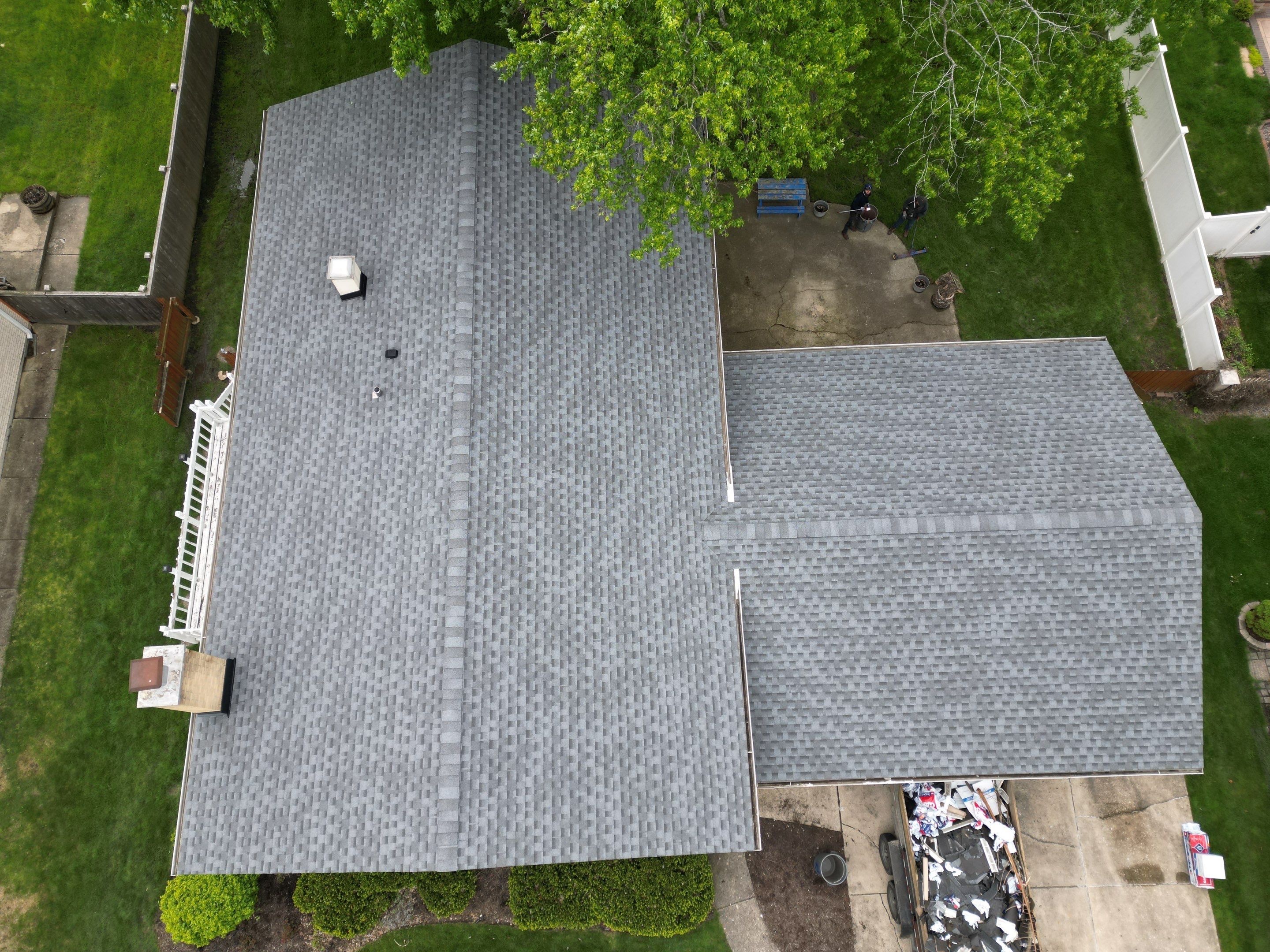 Roof replacement and chimney flashing by Optimal Home Improvement 