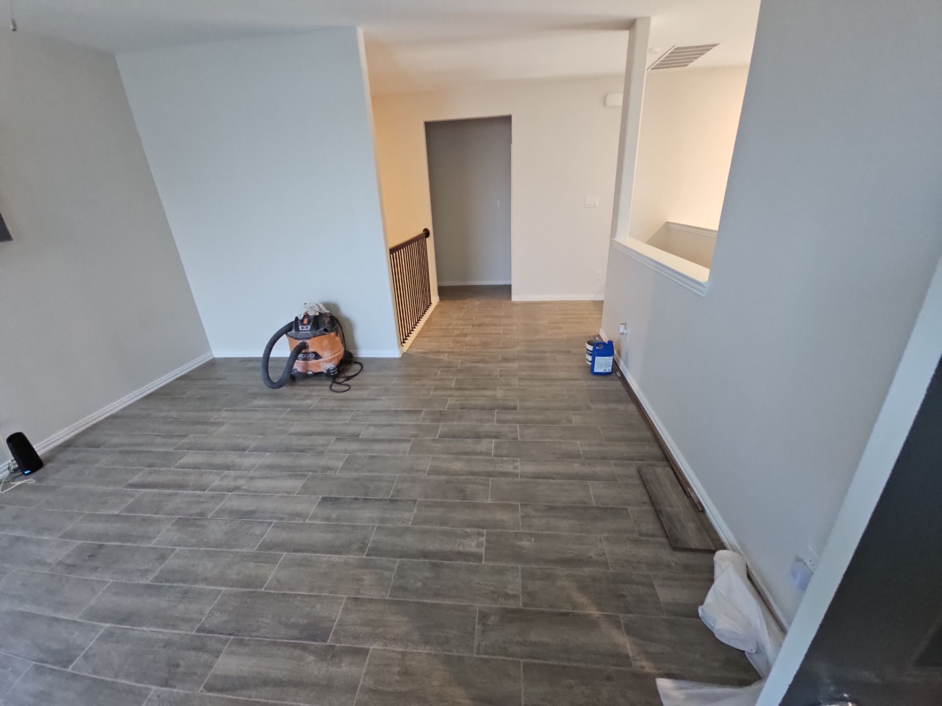 Carpet replacement with Tile and Red Oak Stairs by EL-GC LLC 