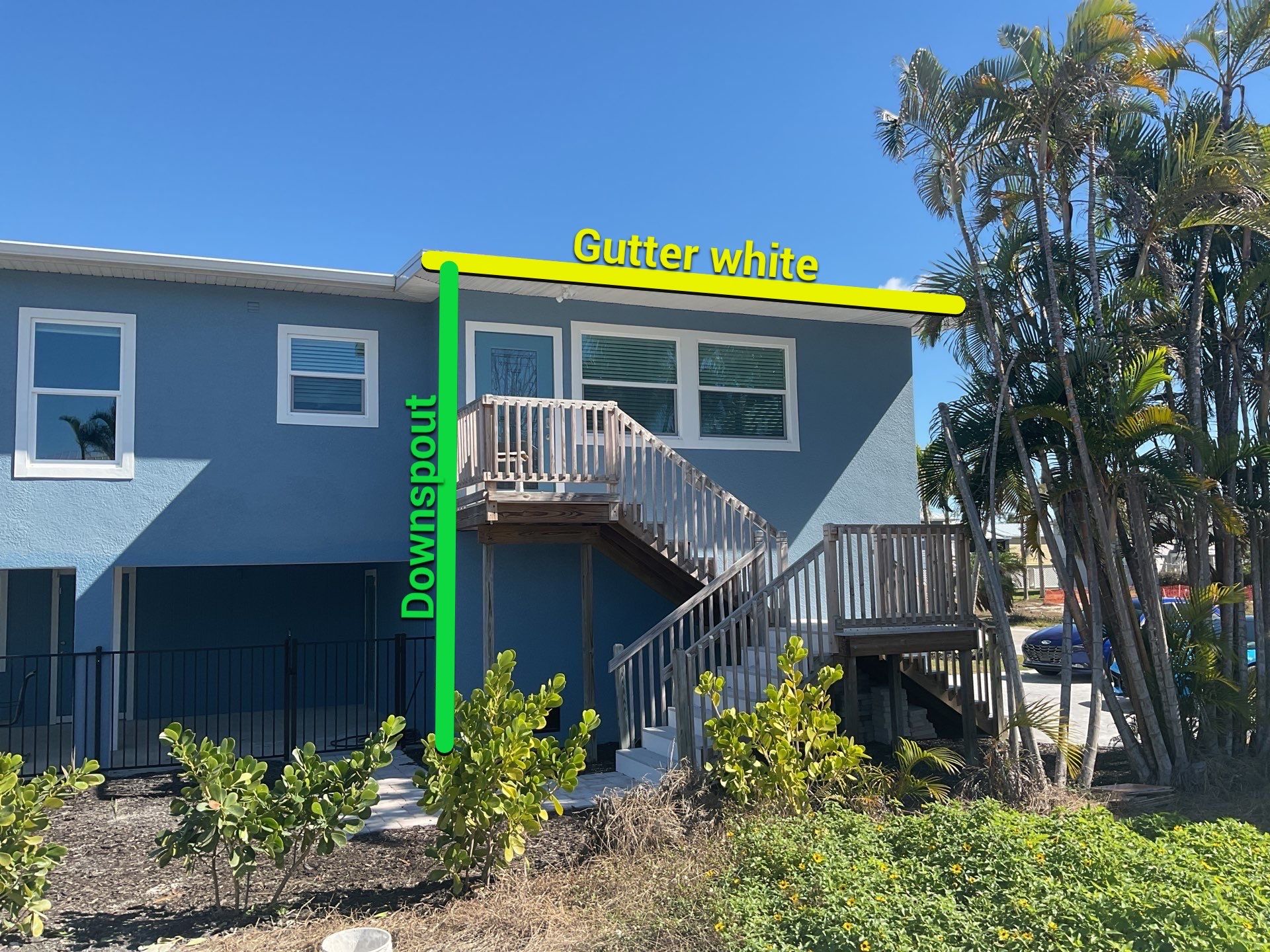 Downspout Installation for Two-Story Home in Fort Myers FL by Gutter Professor by Gutter Professors