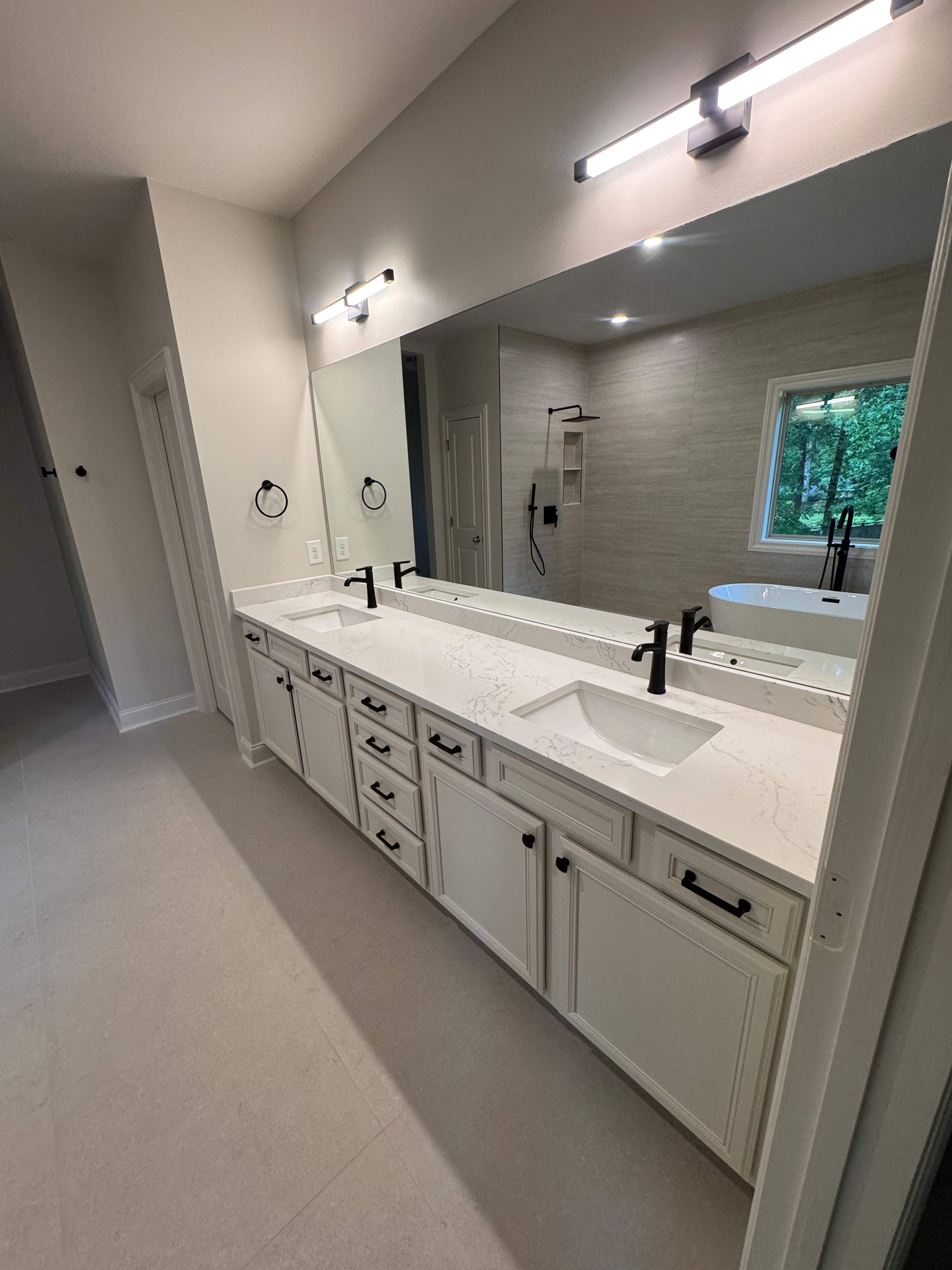 Master bathroom renovation using Free standing tub by Prudencio