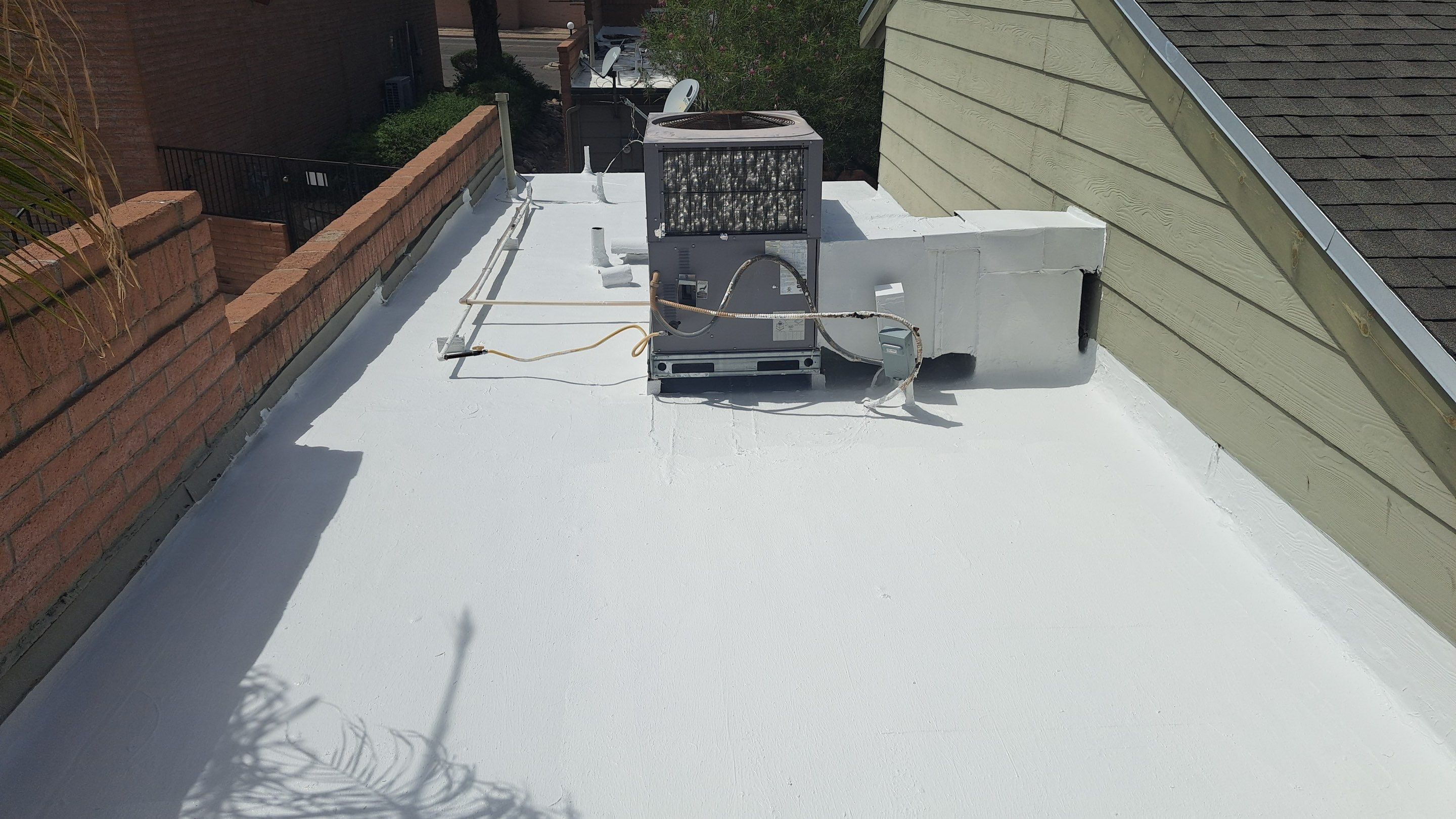 Shingle Roof Replacement and Low Slope Coating in Tucson by West Coast Roofing AZ