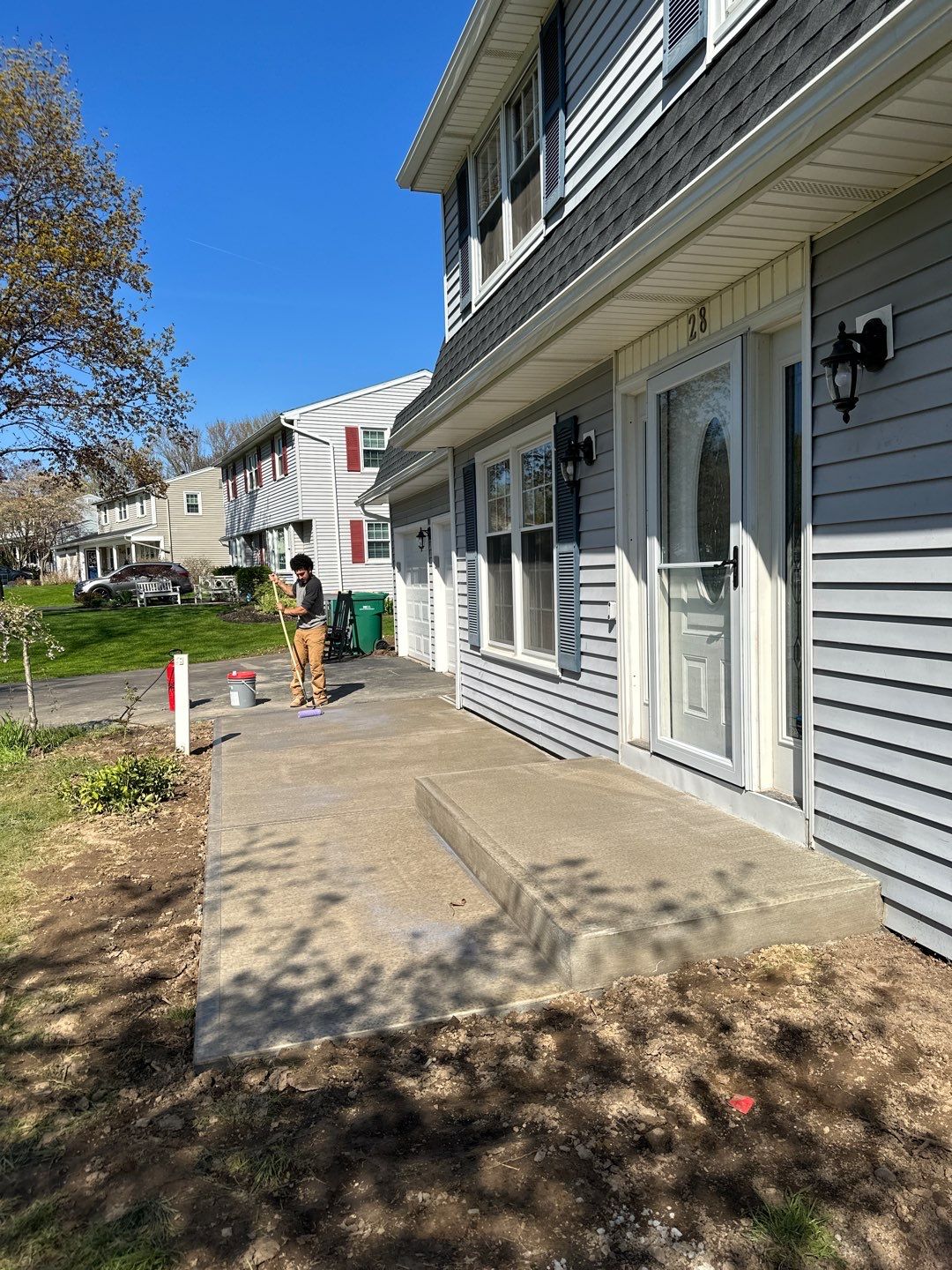Broom finished front patio  by NG Masonry & Construction LLC
