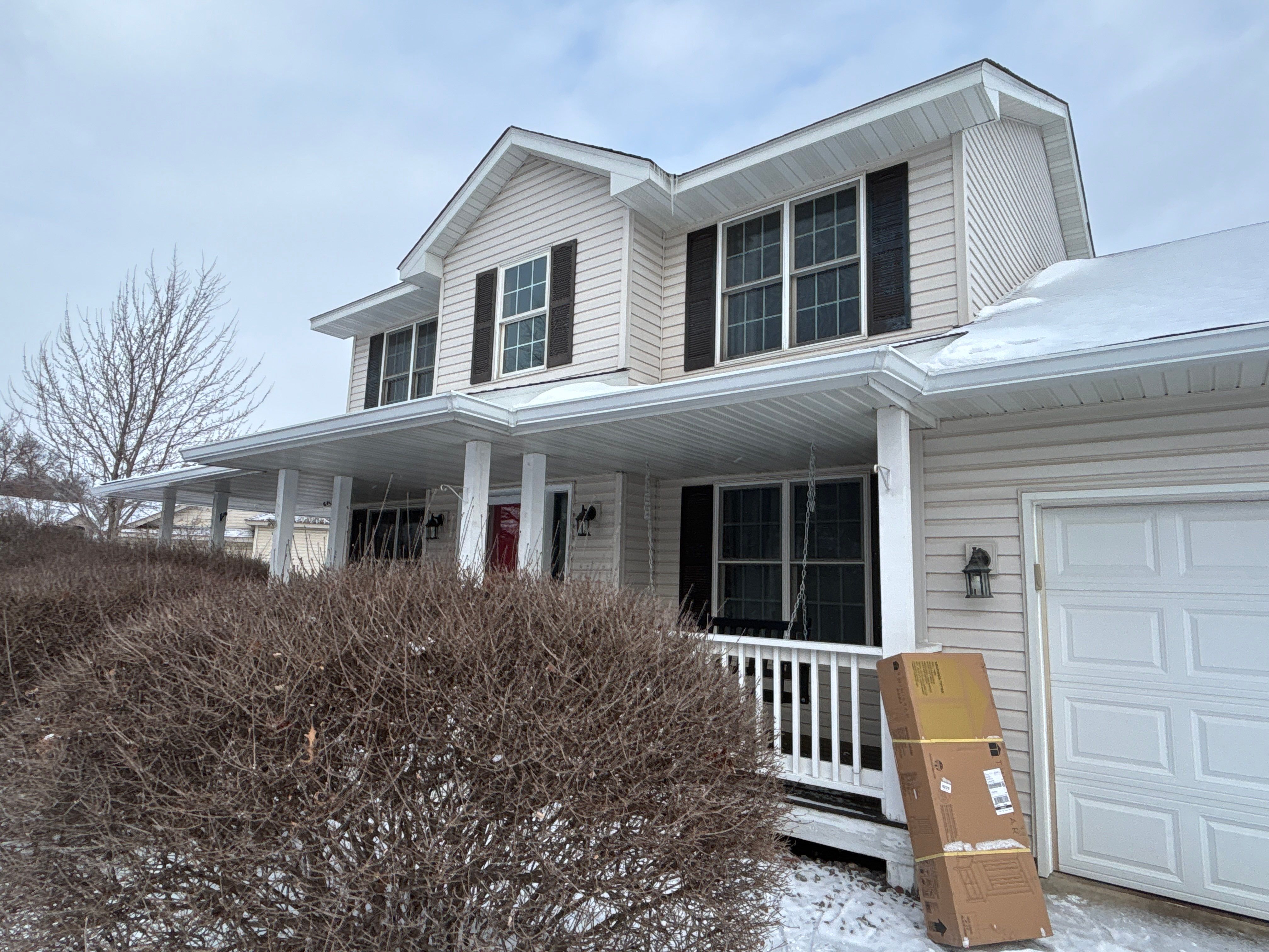 White Seamless Gutter and Downspout Installation in Big Lake by Next Level Seamless Gutters / Exteriors Inc.