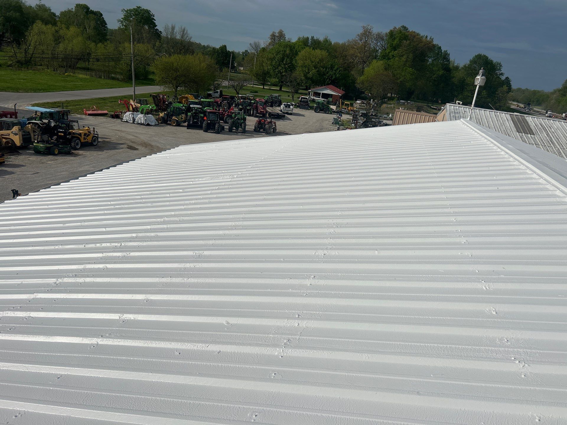 Commercial Metal Roofing Restoration using Coatings by Kentucky Commercial Roofing