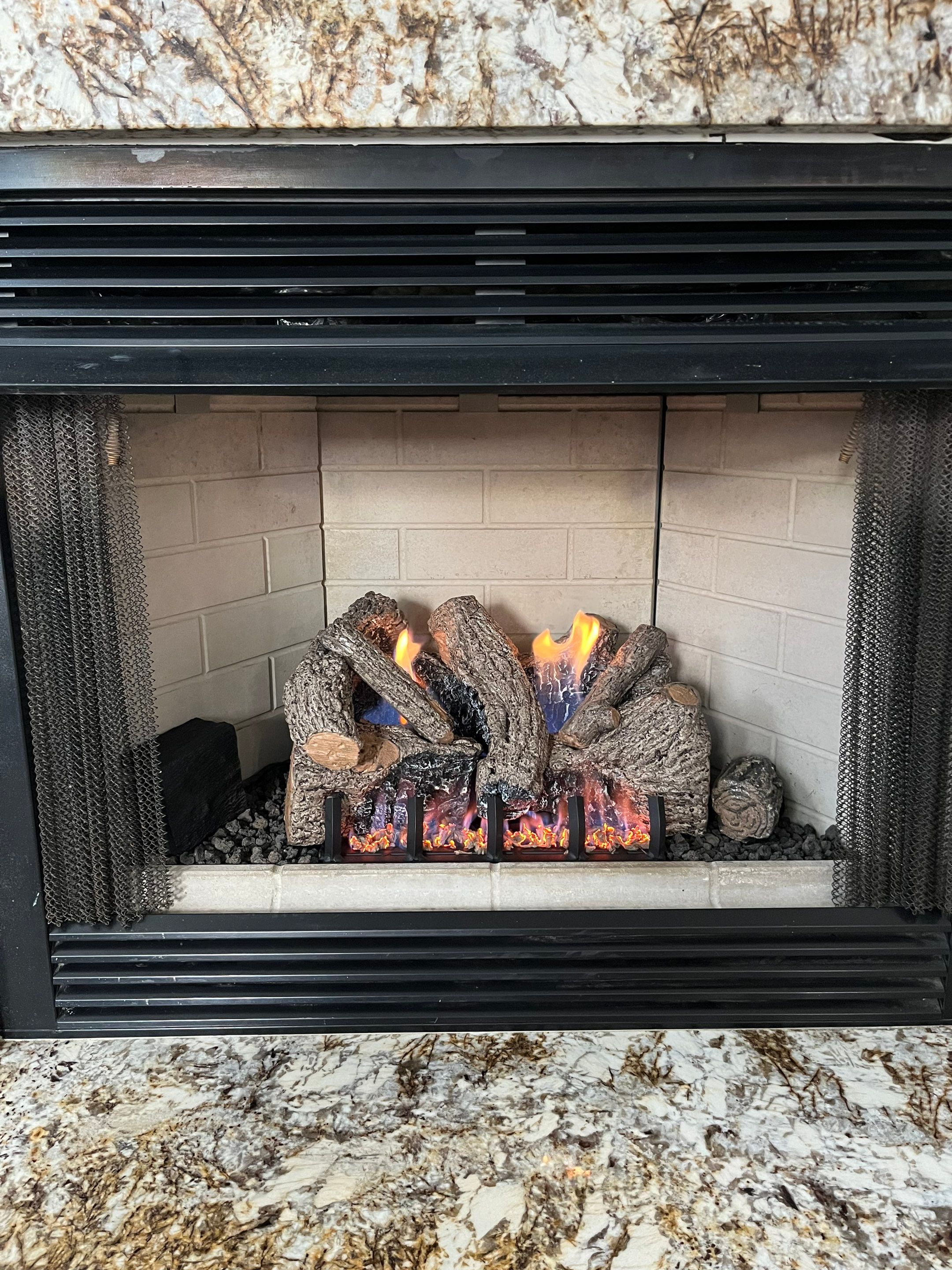 Gas Log Installation in Hampton by Premier Chimney and Roofing