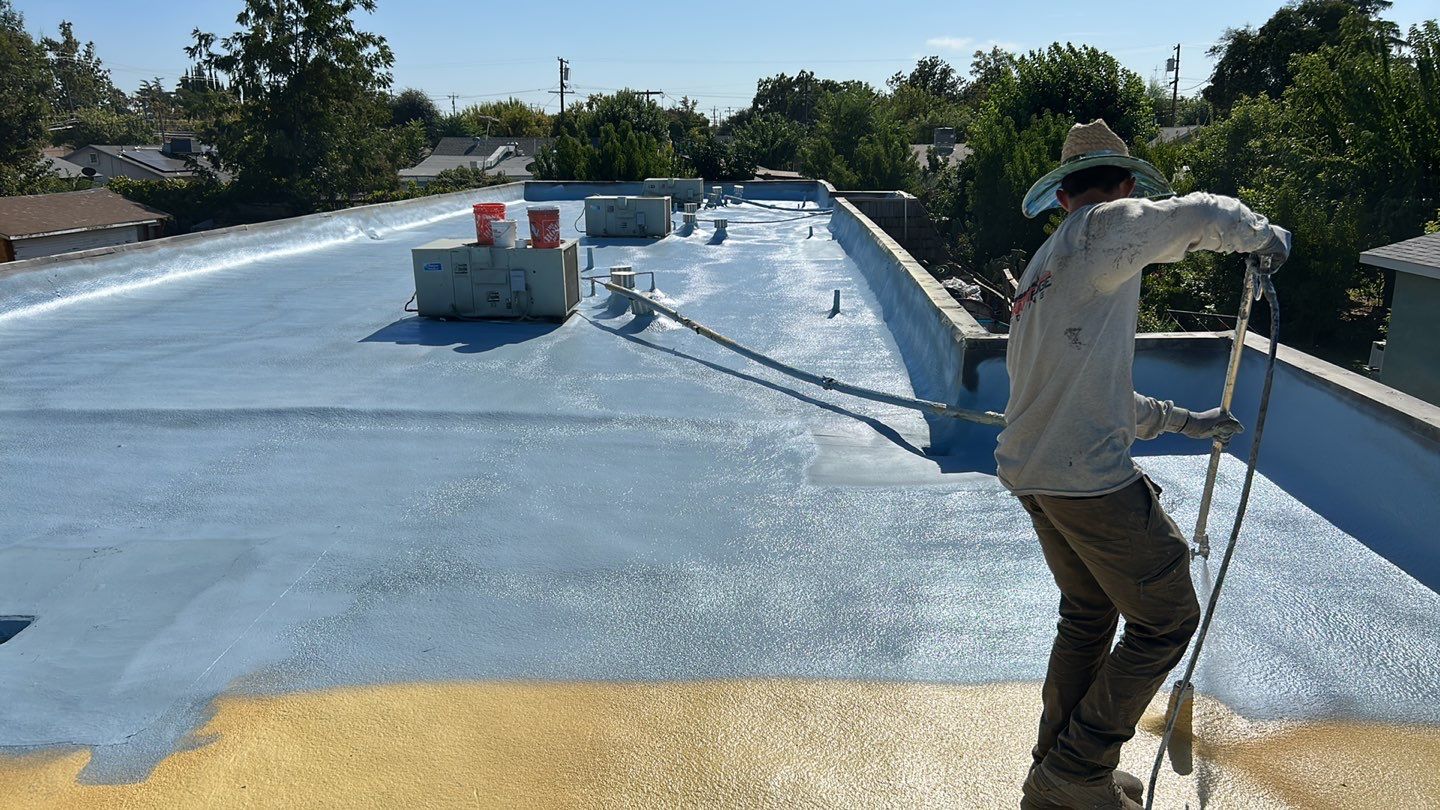 Foam Refurbish using Conklin Benchmark/PUMA XL coatings and spray foam; Also metal roofing around parapet wall by Straight Edge Roofing Inc