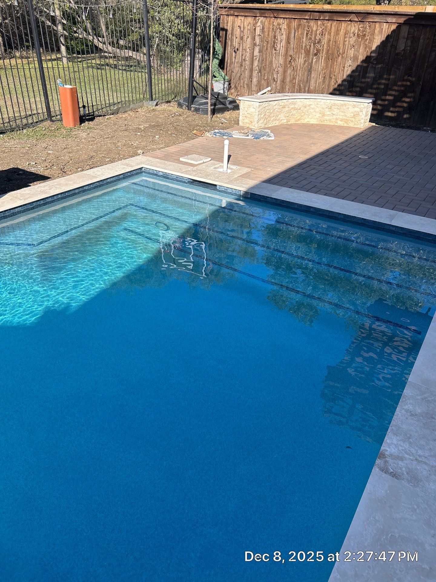 Geometric Pool with Pergola and Outdoor Kitchen by Pinnacle Pools and Spas - DFW