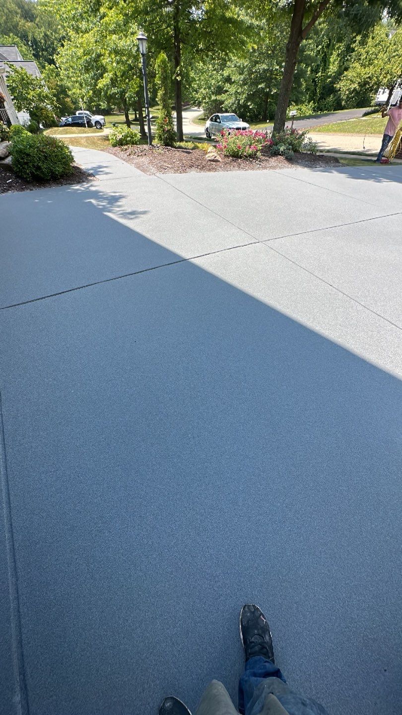 Pool Deck + Driveway + Garage Project in Venetia by Floors in a Day, Inc