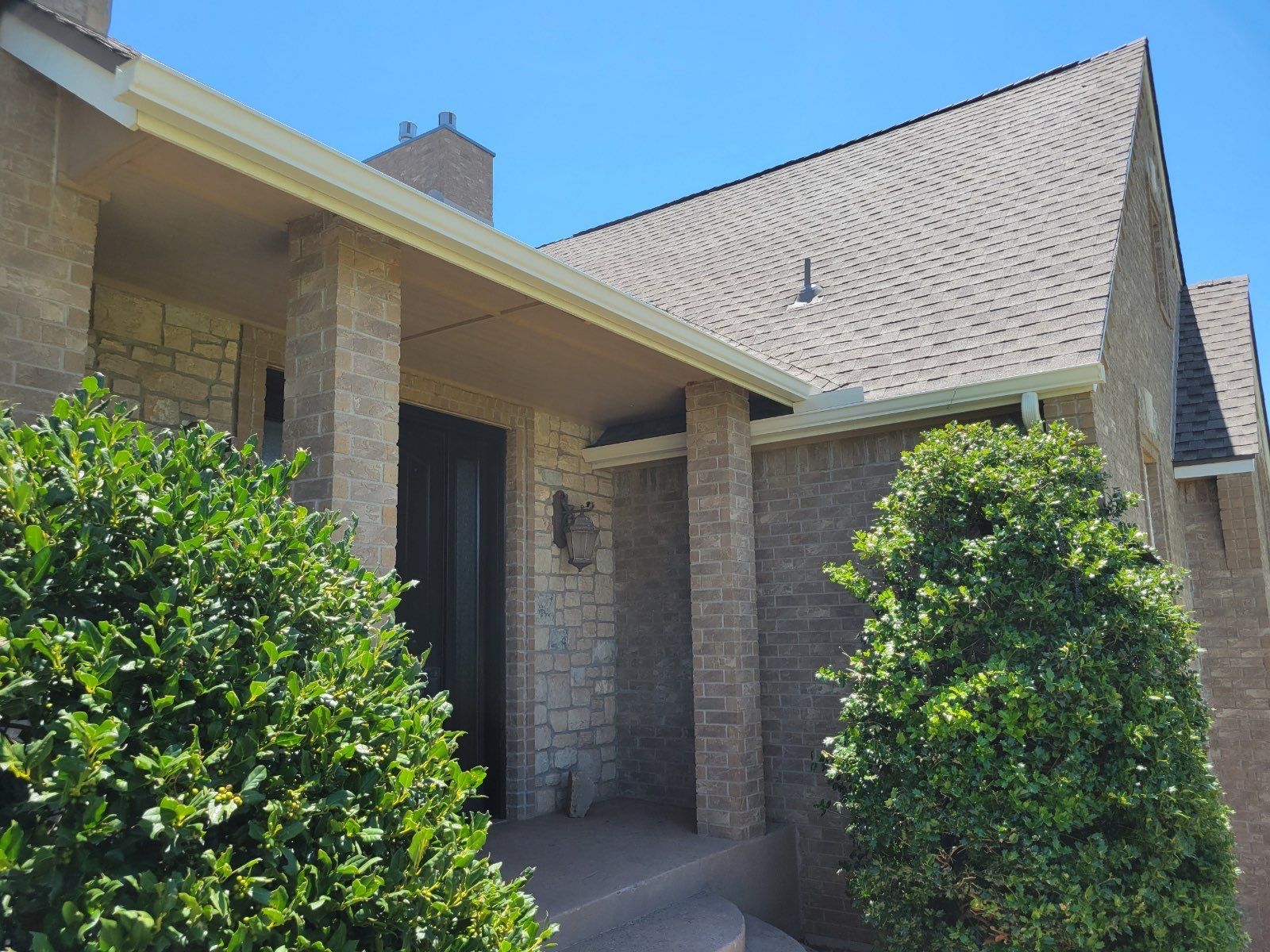 Roof Replacement and Gutter Installation in Edmond, OK by McCann's Roofing and Construction