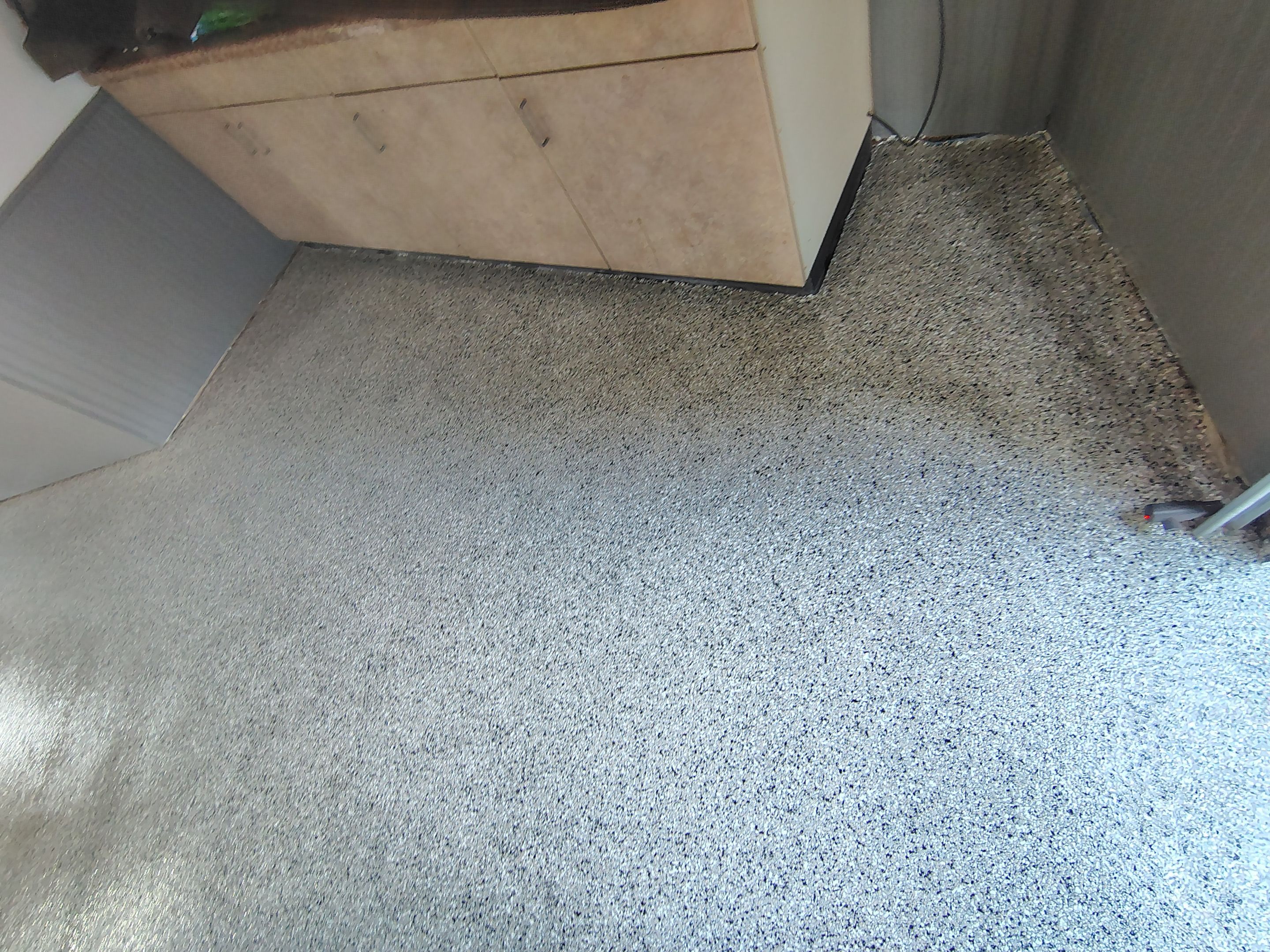 Multi-Fleck Epoxy Garage Floor Coating in Dell Rapids by Select Painting, Coatings & Garage Cabinets