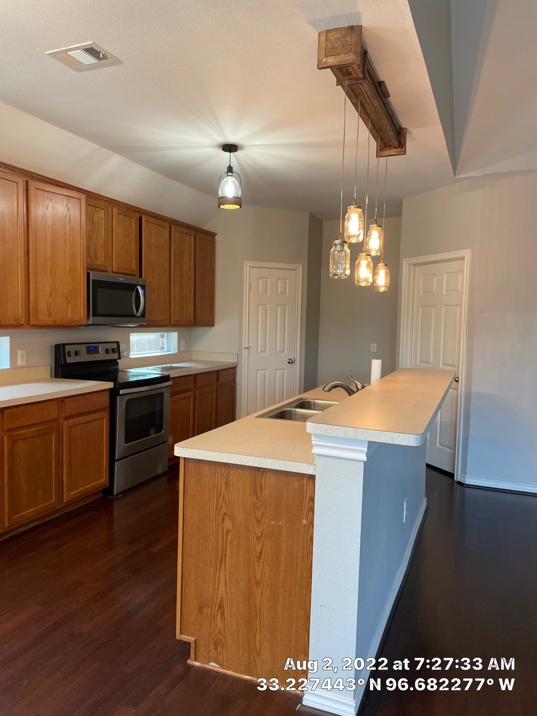 Custom cabinetry Kitchen Remodel by SLM General Contractors & Roofing