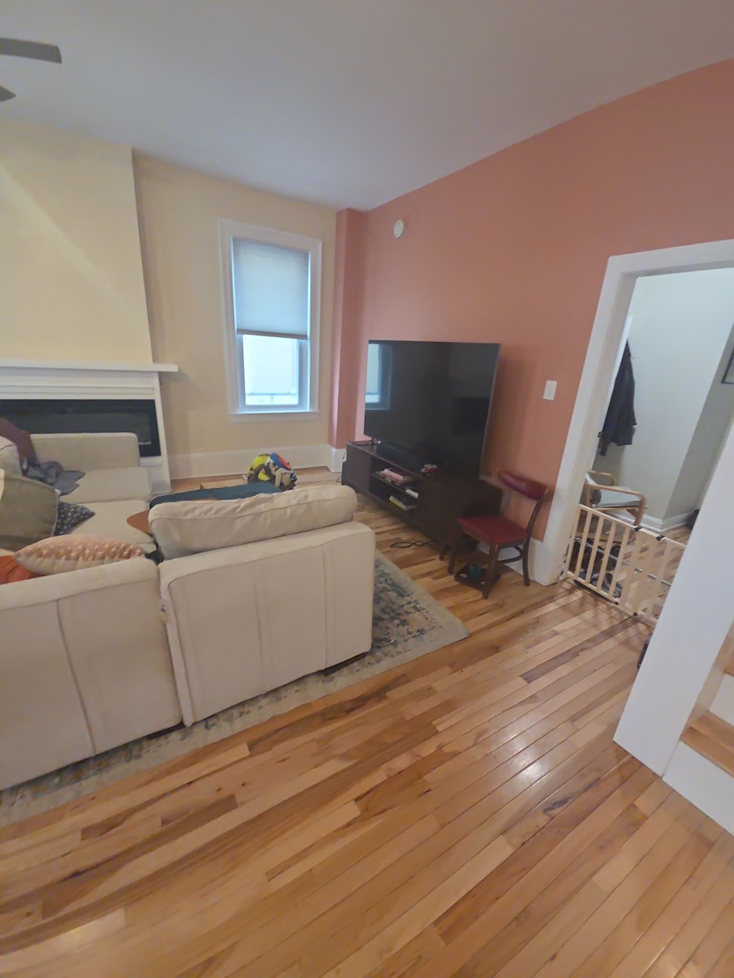 A Warm Neutral Living Room with a Bold Accent Feature by Groovy Hues