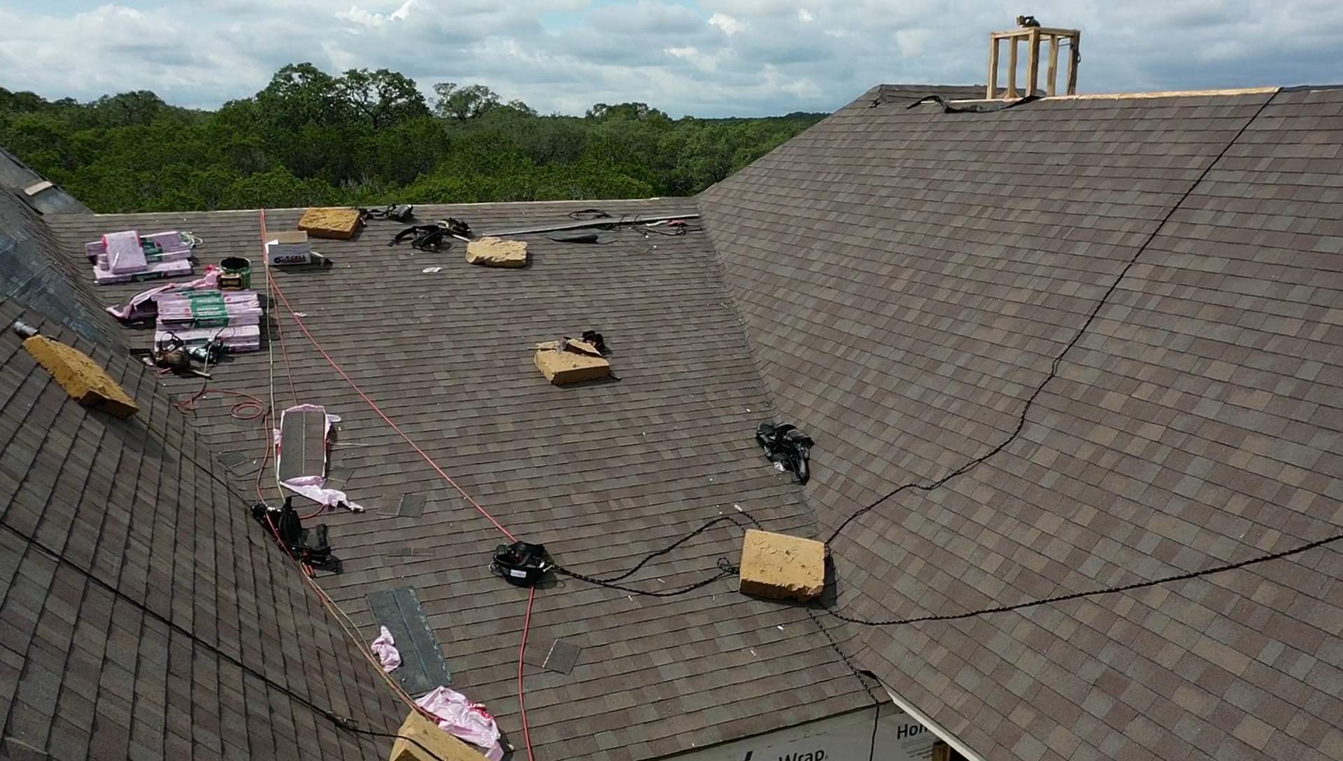 New Home Construction using Owens Corning 30 year Architectural Shingles by Premier Roofing and Contracting