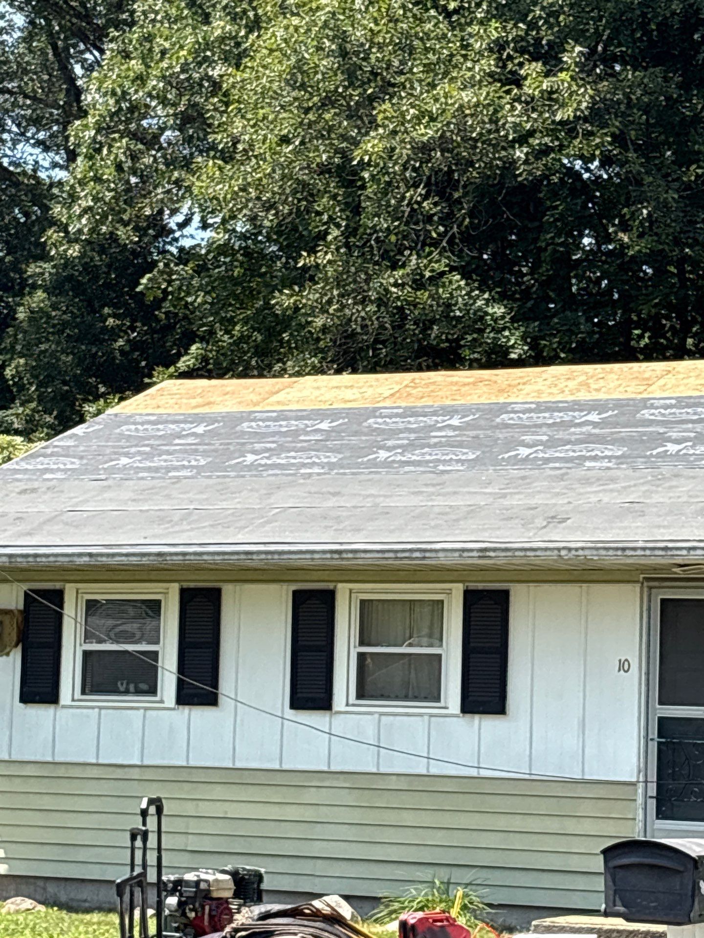 Onyx Black Roof Transformation in Maynard, MA by Mighty Dog Roofing of Greater Middlesex County