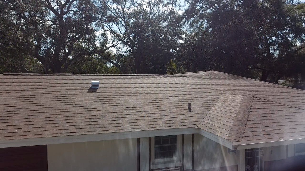 Shingle Replacement with Gaco sealant on Flat Roof Altamonte Springs FL by Pinnacle Roofing Group