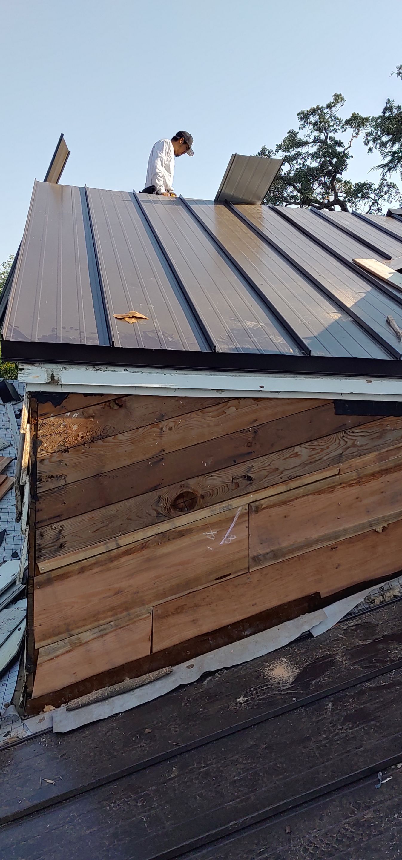 Residential Roofing Installation using Standing seam metal roofing system by Straight Edge Roofing Inc
