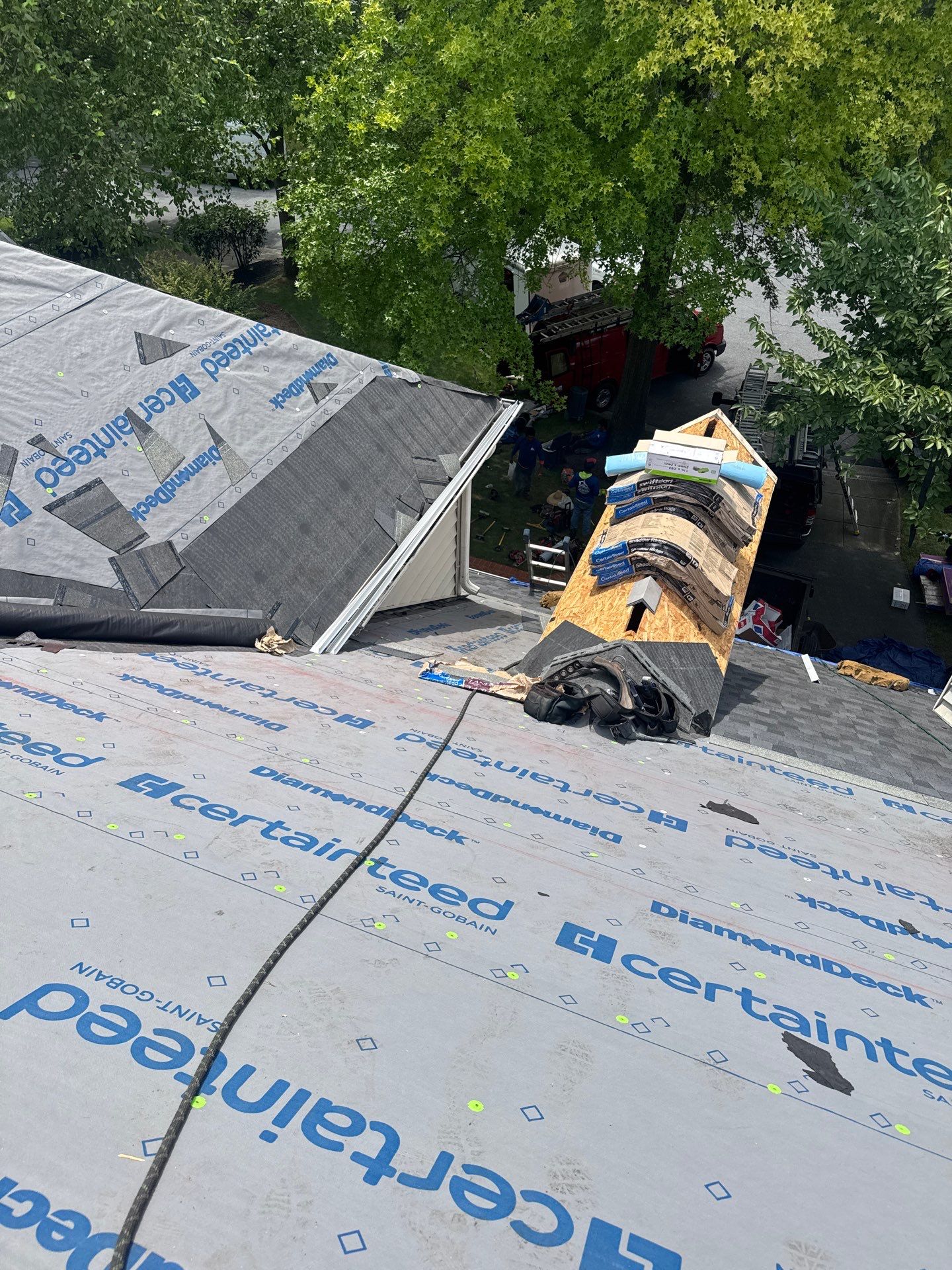 New Shingle Roof & New Gutters and downspouts with covers by Alpha Design Services