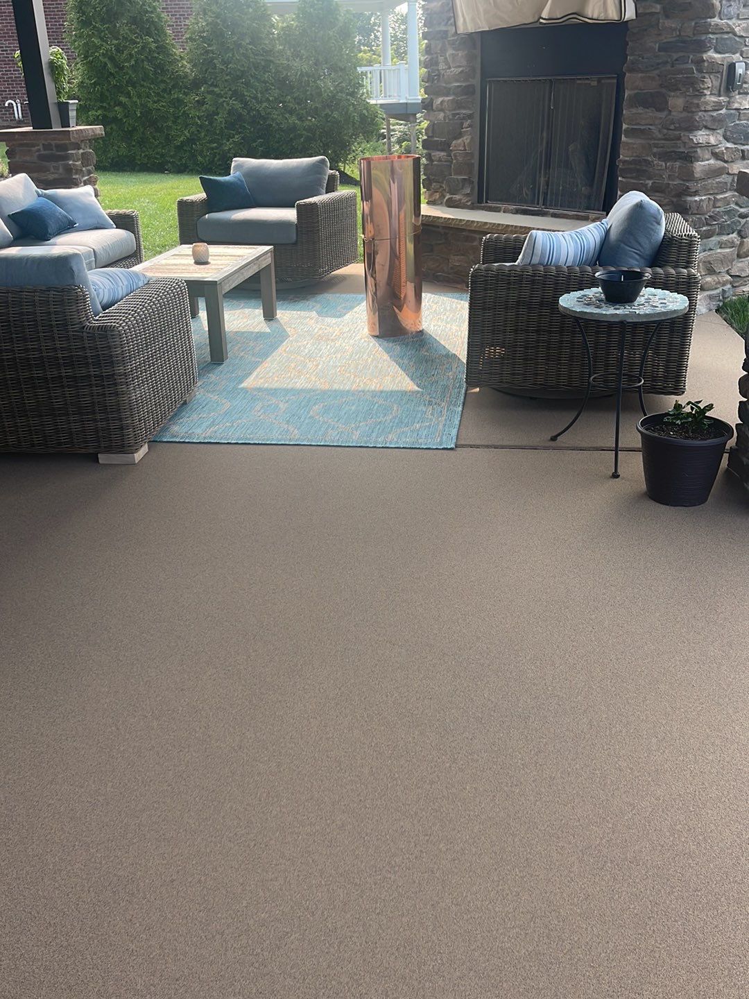 Large Patio + Garage Project in Moon Township by Floors in a Day, Inc
