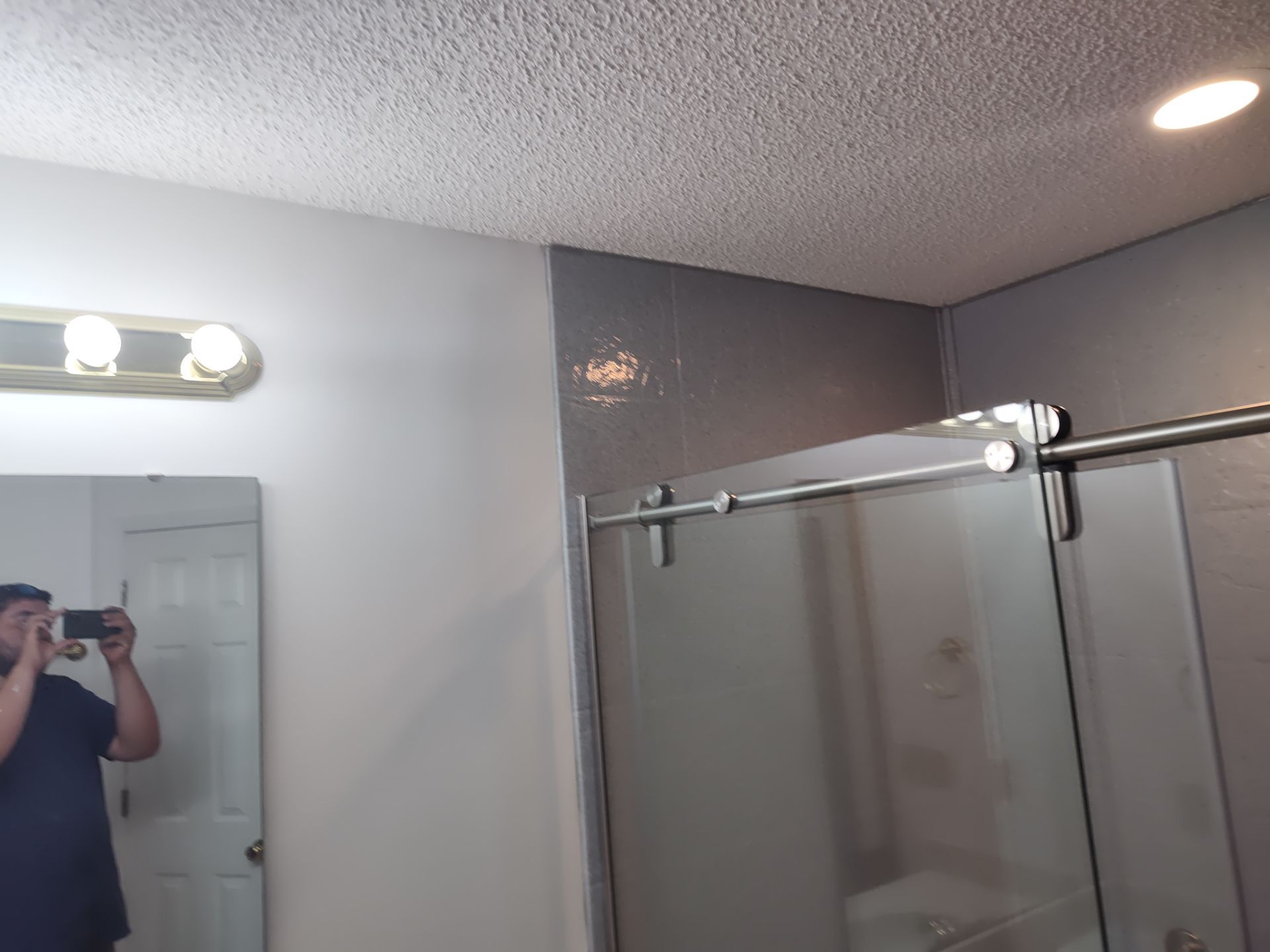Bathroom Remodel using Onyx base and shower walls with seat & caddie by Cornerstone Home Builders, LLC