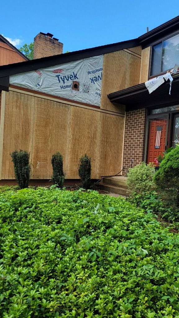 Woodbridge: T1-11 Pywood Panel Siding Installation by RM Banning, Inc.