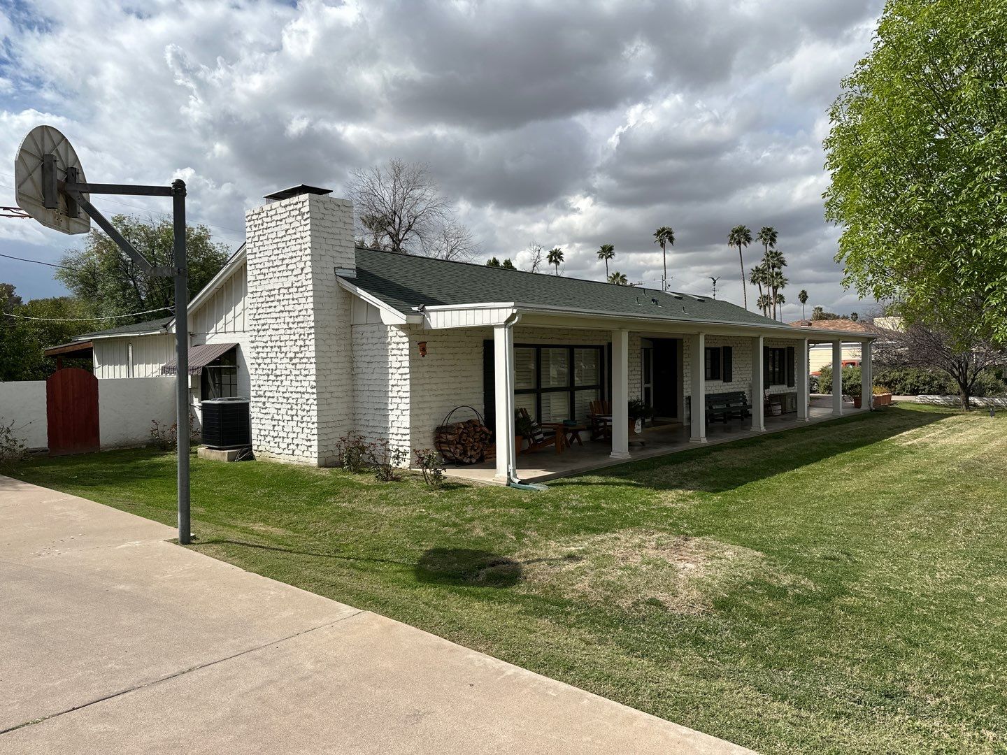 Wagon Wheel - A Stunning Home Exterior Makeover with Dunn Edwards Paints in Phoenix, AZ by Double G Painting Contractors, LLC