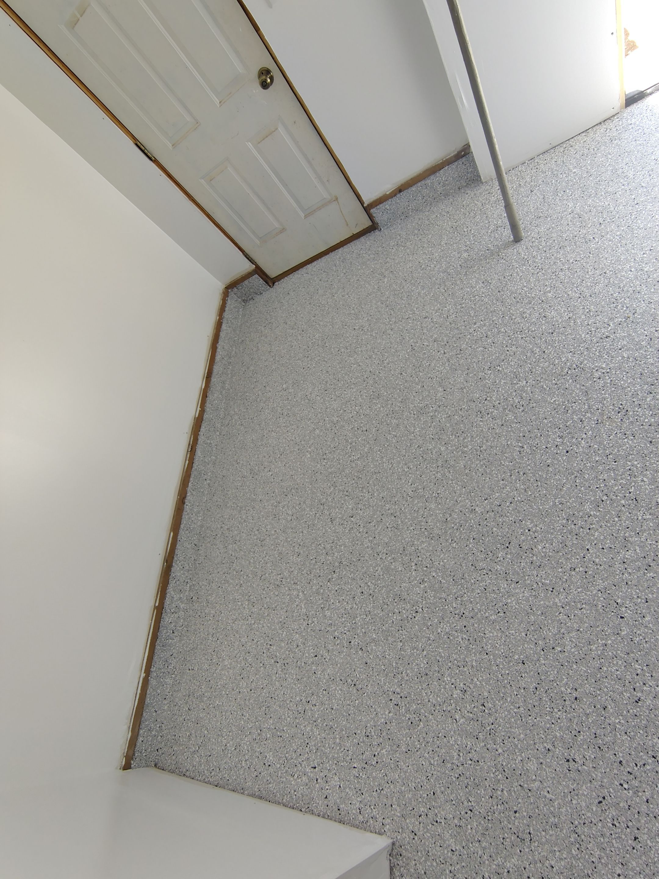 Decorative Chip Concrete Coating Installation in Luverne by Select Painting, Coatings & Garage Cabinets