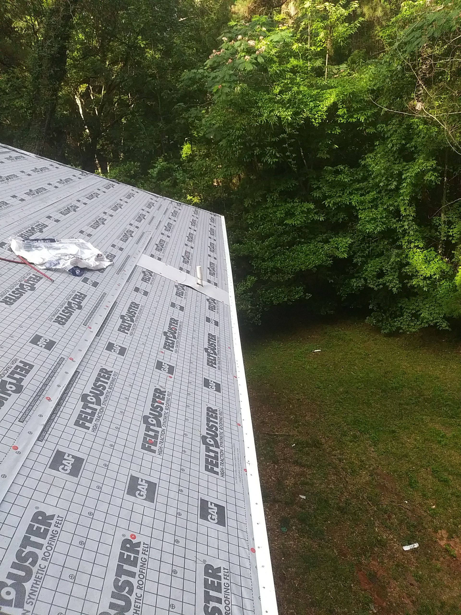 Residential Roofing Installation using Roof Replacement by American Roofing & Construction LLC