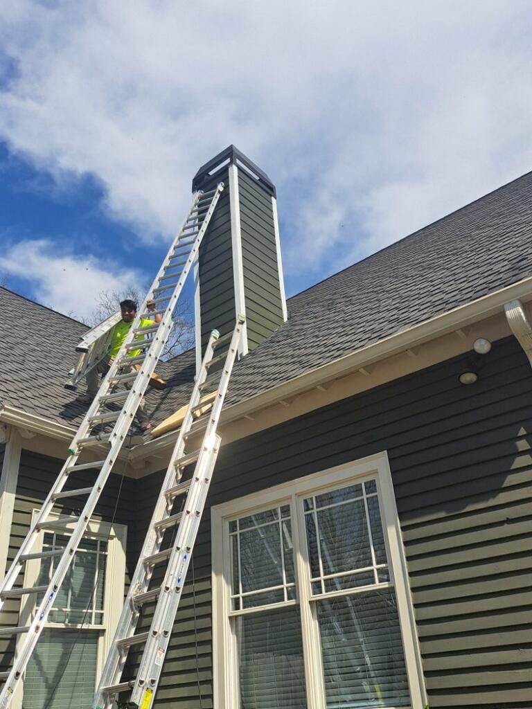 all NEW Siding on Rotted Chimney  by Nailed It Roofing & Remodeling LLC