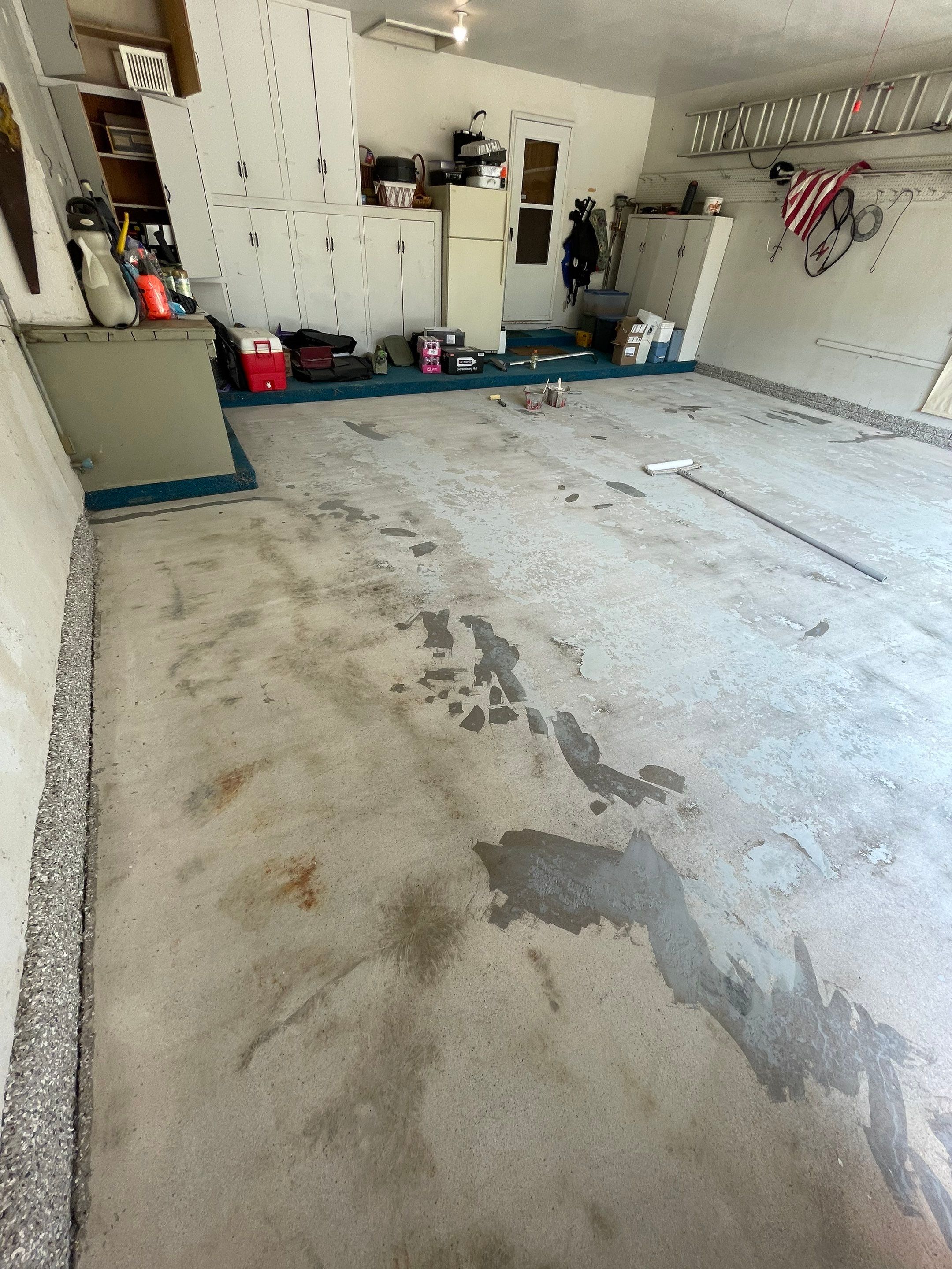 Custom Creekbed Garage Floor Coating in Sioux Falls by Select Painting, Coatings & Garage Cabinets
