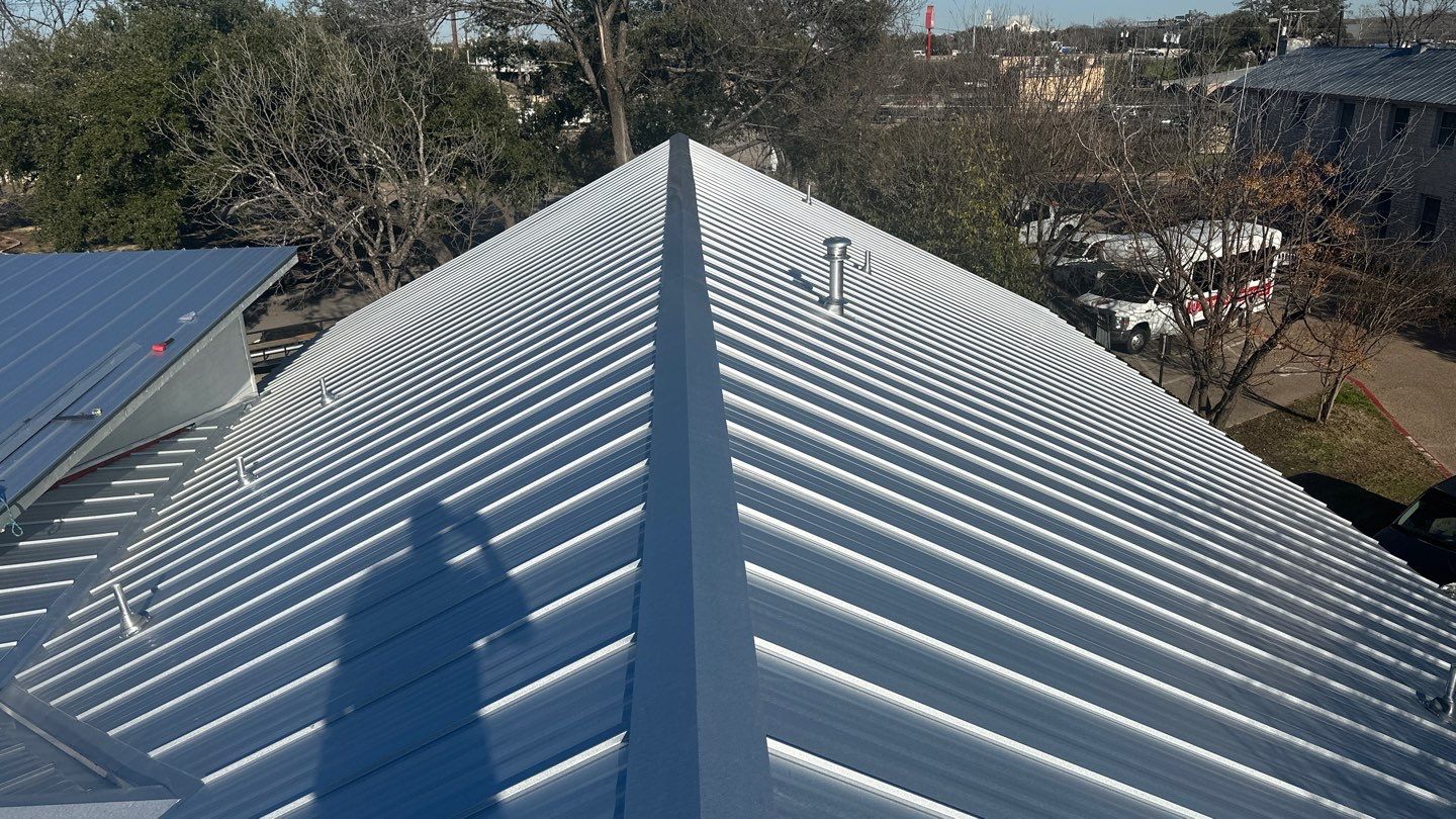 Commercial Roofing Installation using 24 GA Double-Lock - Galvalume by Action Exteriors Austin