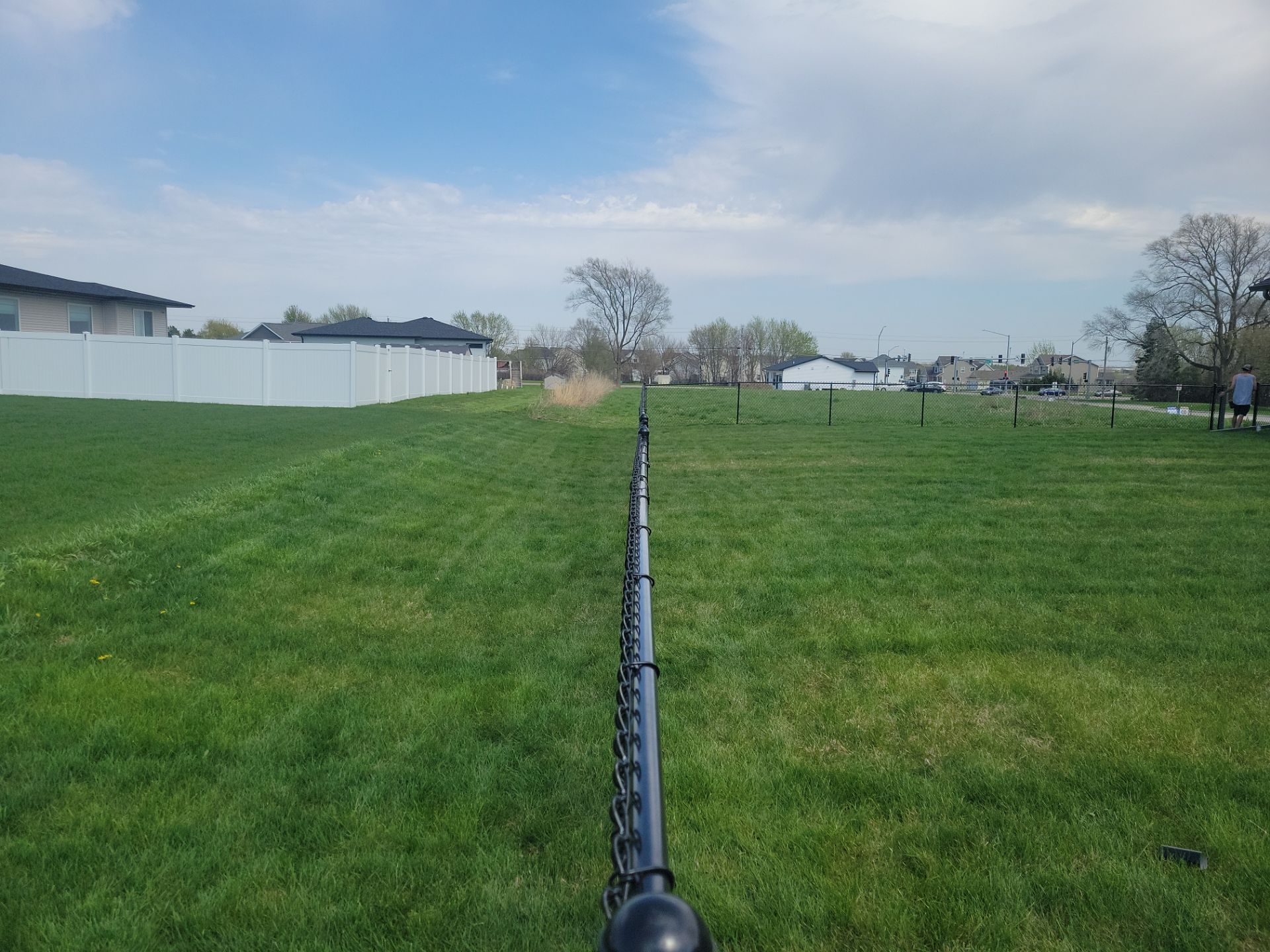 Black Chain Link Fence and Gate Installation in Cedar Falls by Perfect Picket Fence and Stain