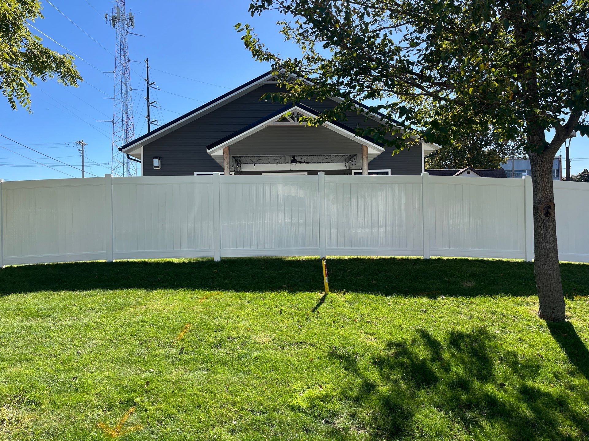 White Vinyl Privacy Fence Installation in Grundy Center by Perfect Picket Fence and Stain