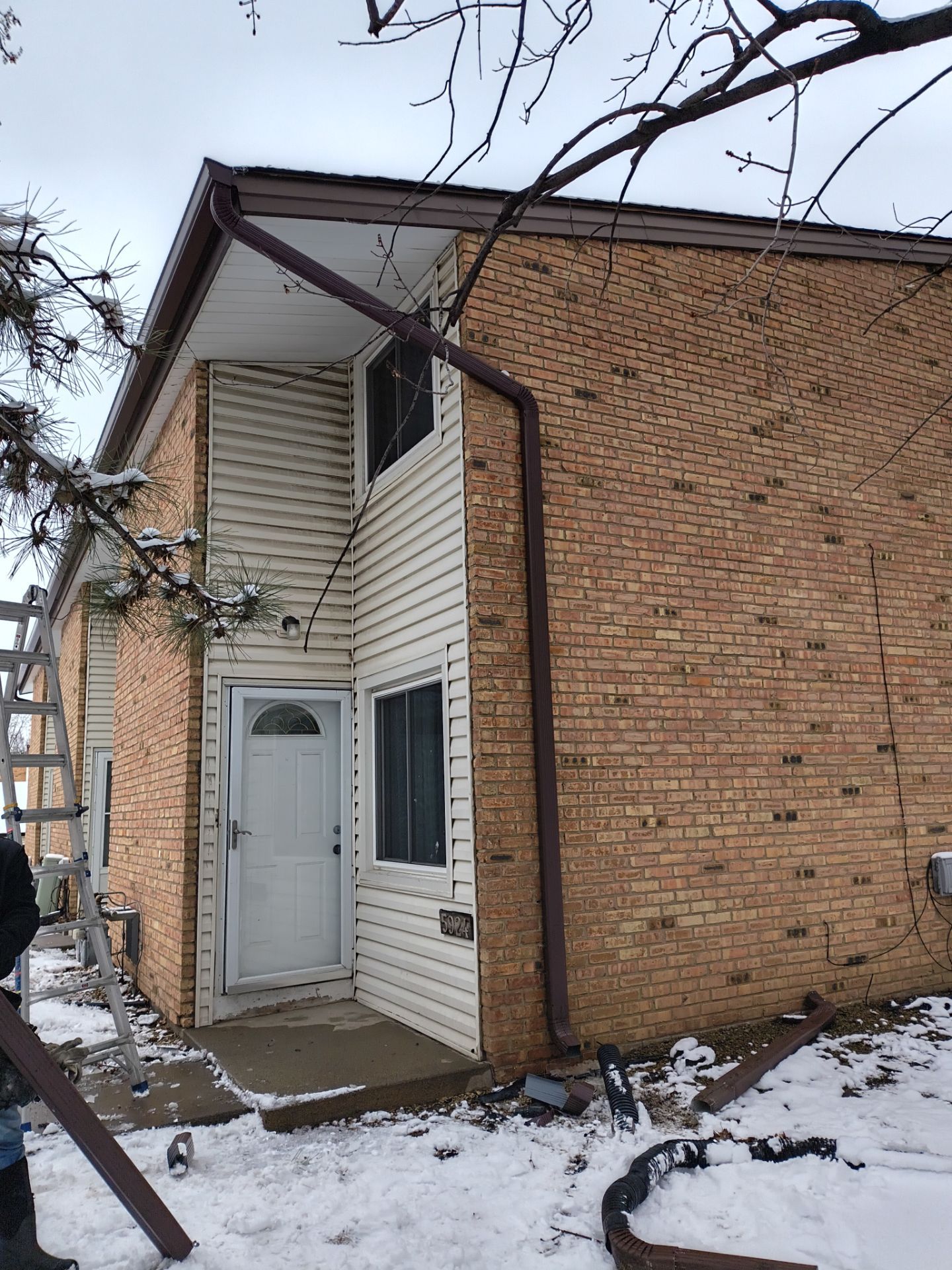 Multi-Unit Gutter and Downspout Installation in Brooklyn Park by Next Level Seamless Gutters / Exteriors Inc.