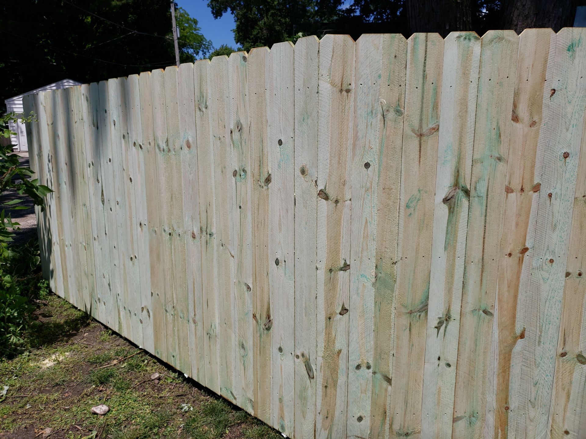Pressure-Treated Pine Privacy Fence Replacement in Waterloo, Iowa by Perfect Picket Fence and Stain