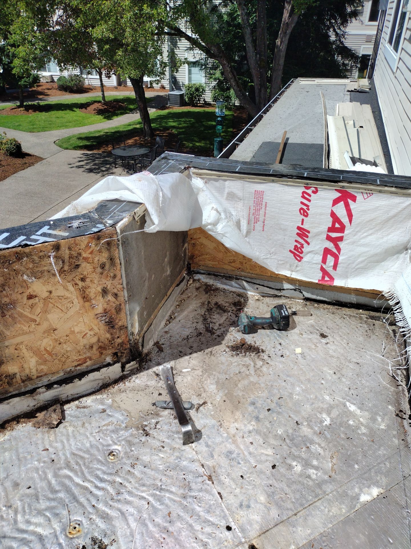 Dec-Tec Walkable Membrane using Dec-Tec (Color: Granite) by Orezona Building & Roofing Company, Inc.
