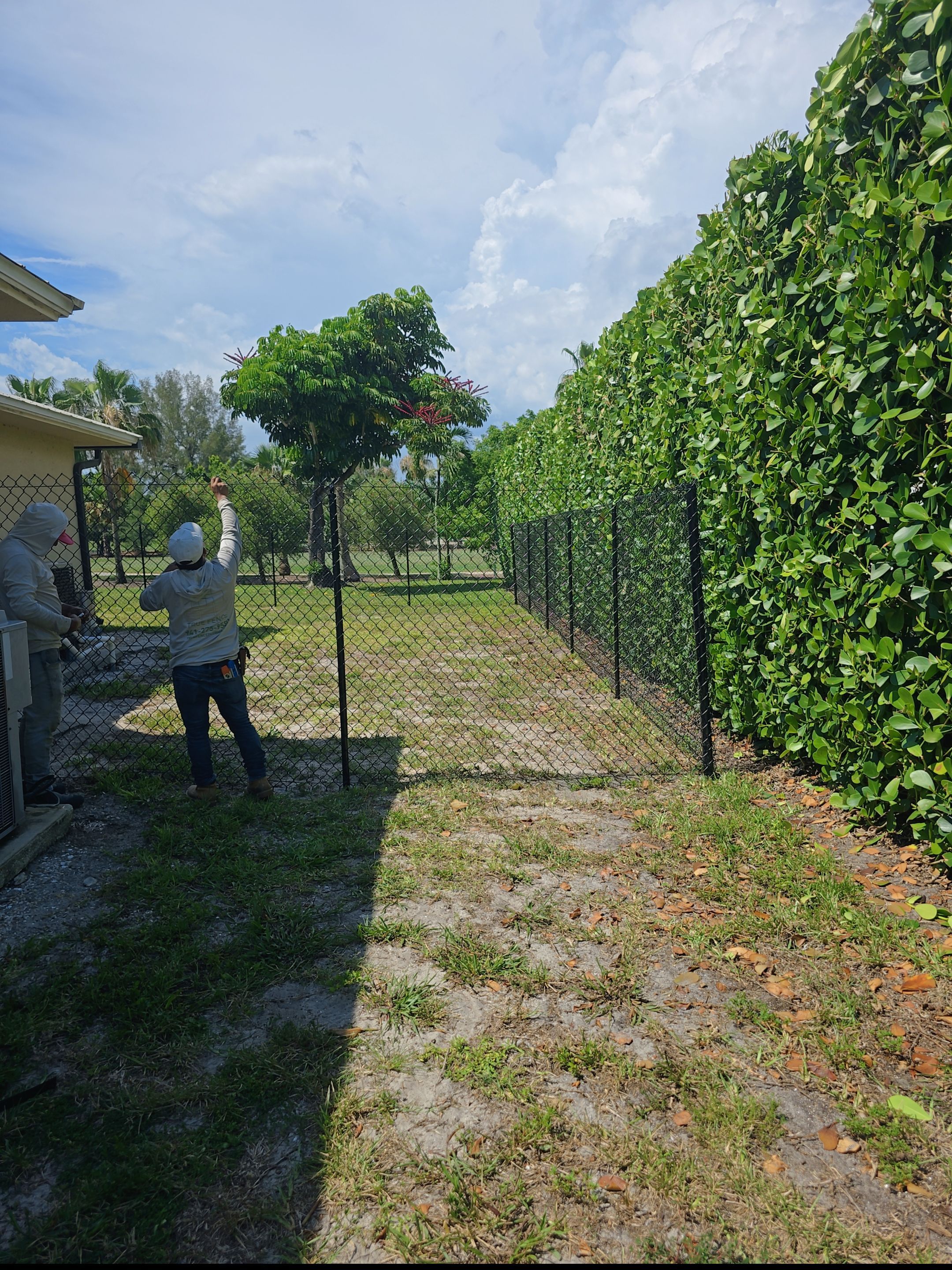 Black Aluminum Picket Fence Installation in Marco Island by True Fence LLC