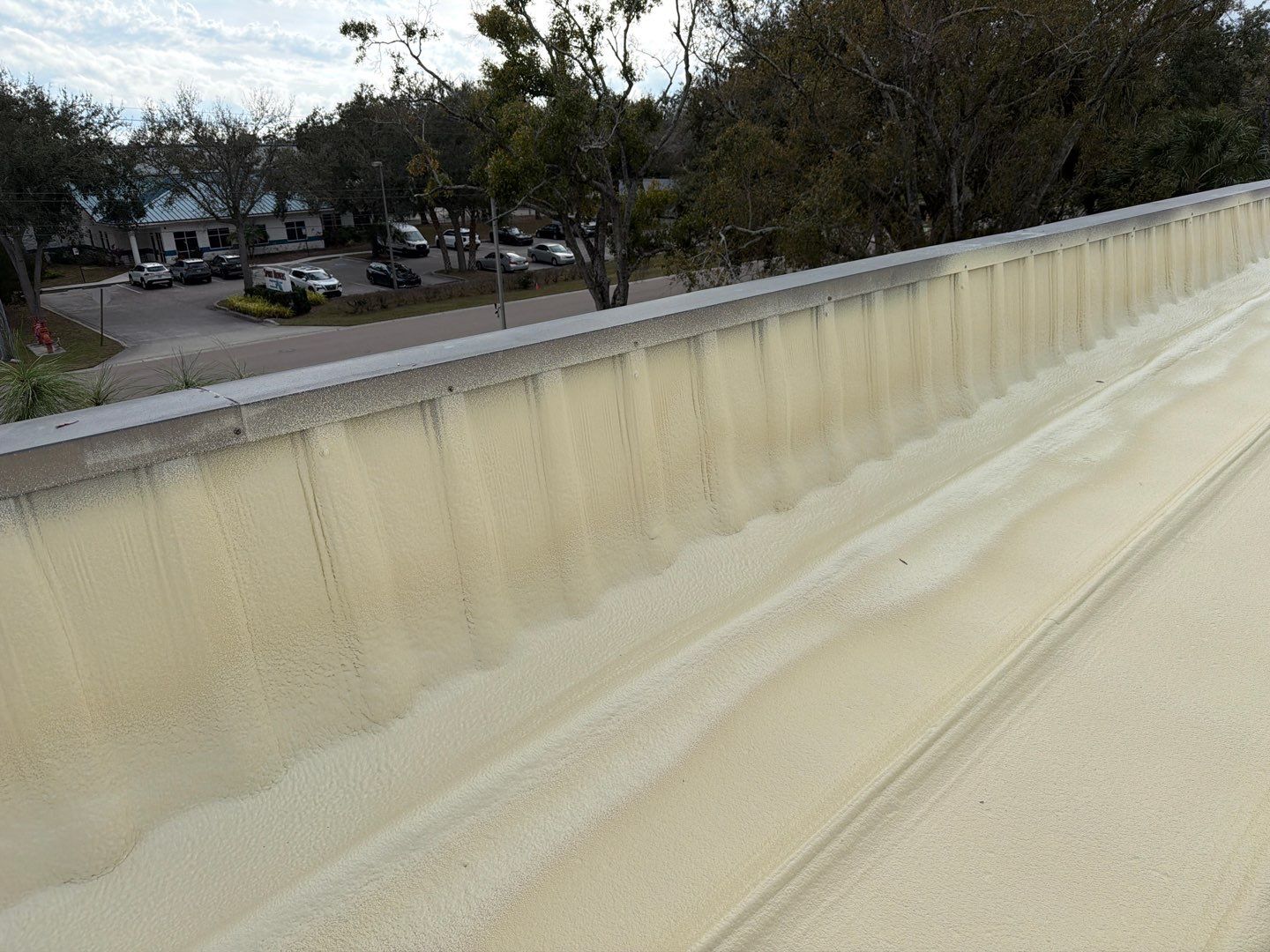 Sarasota Industrial Warehouse Metal Roof Silicone Coating Restoration by CES Roofing