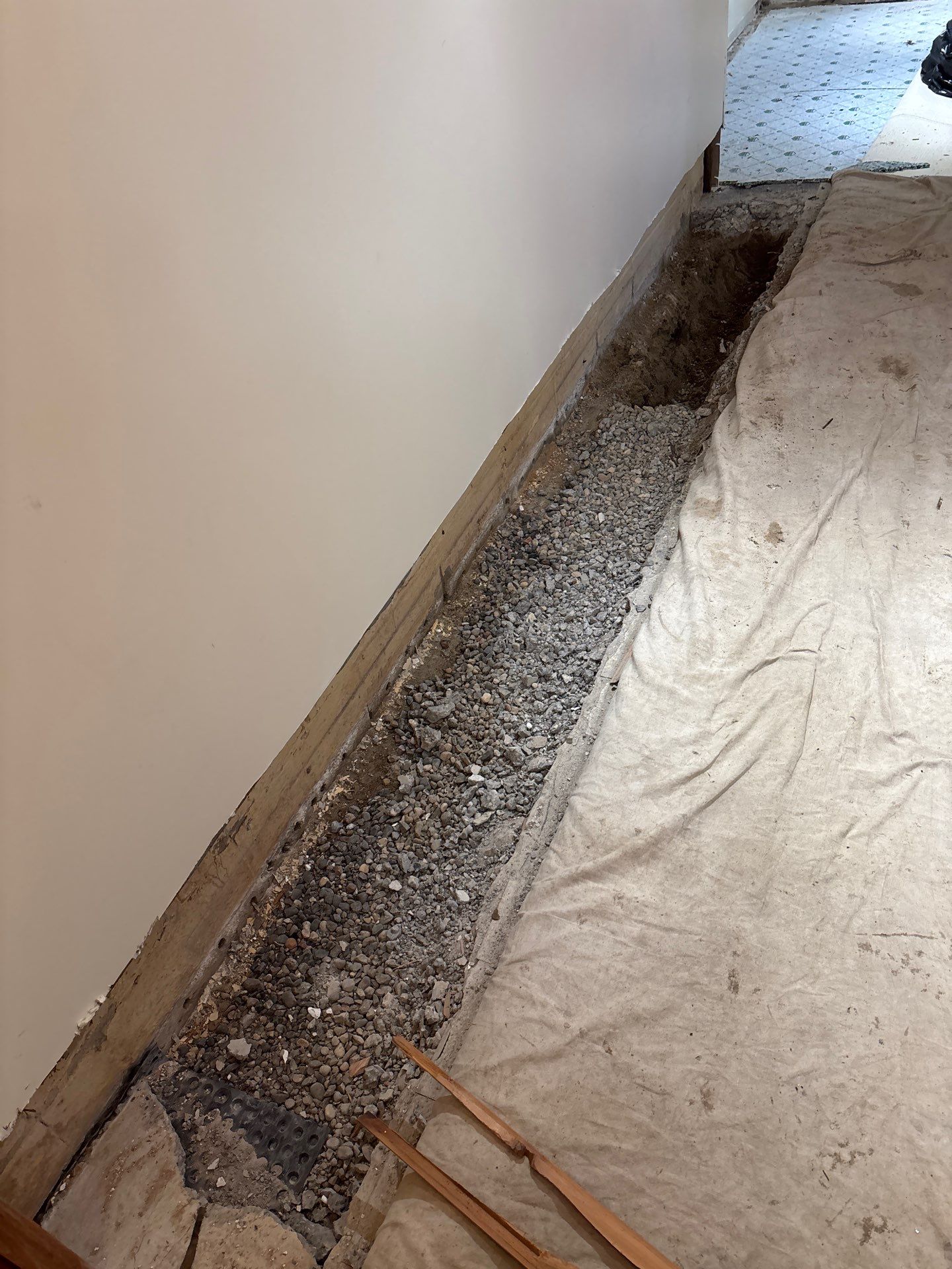 Completing the Connection for Lisa's Drain Tile System by Waterproofing Northeast