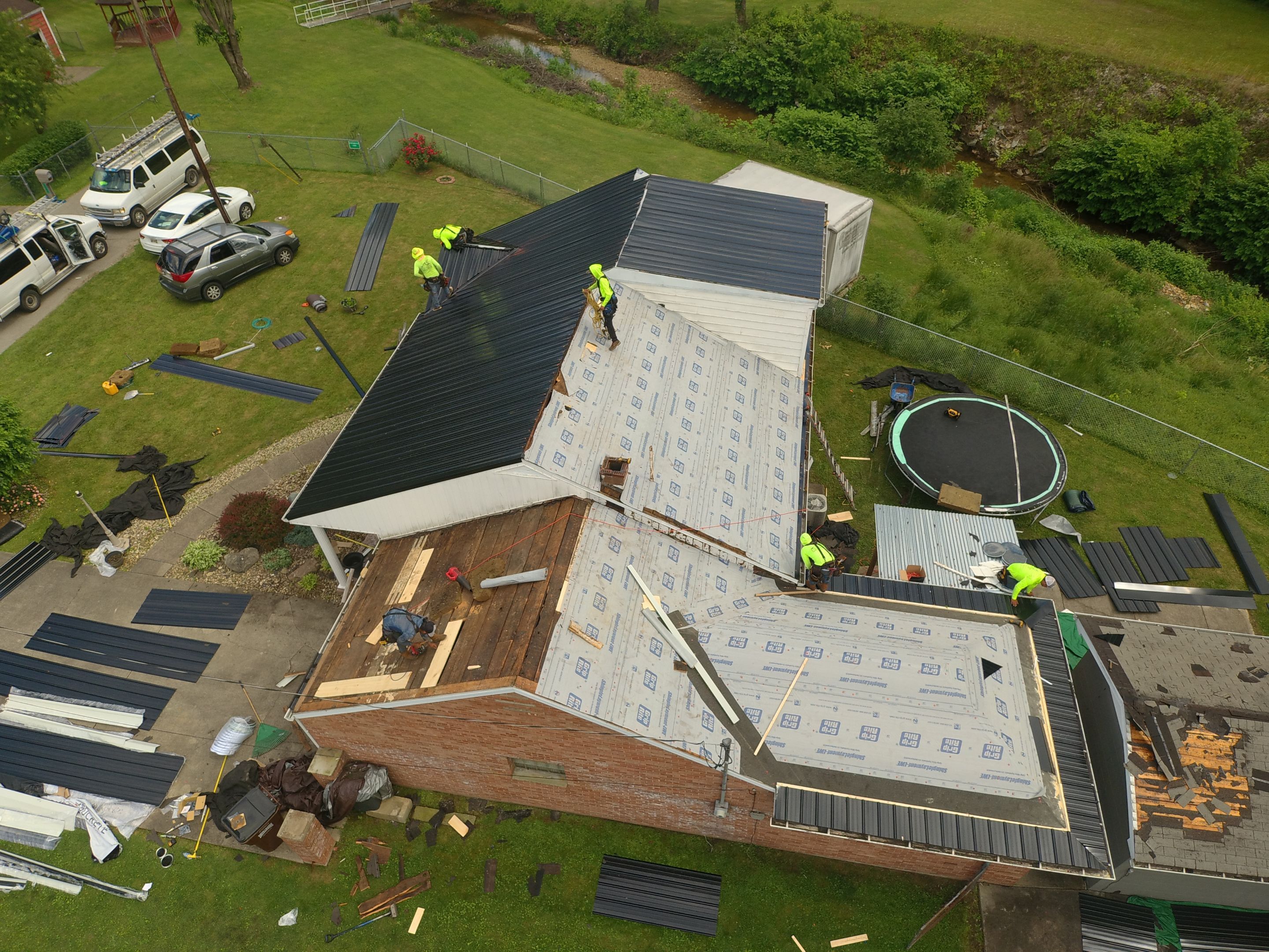 Residential Roofing Installation using Metal by Mr. Roofer
