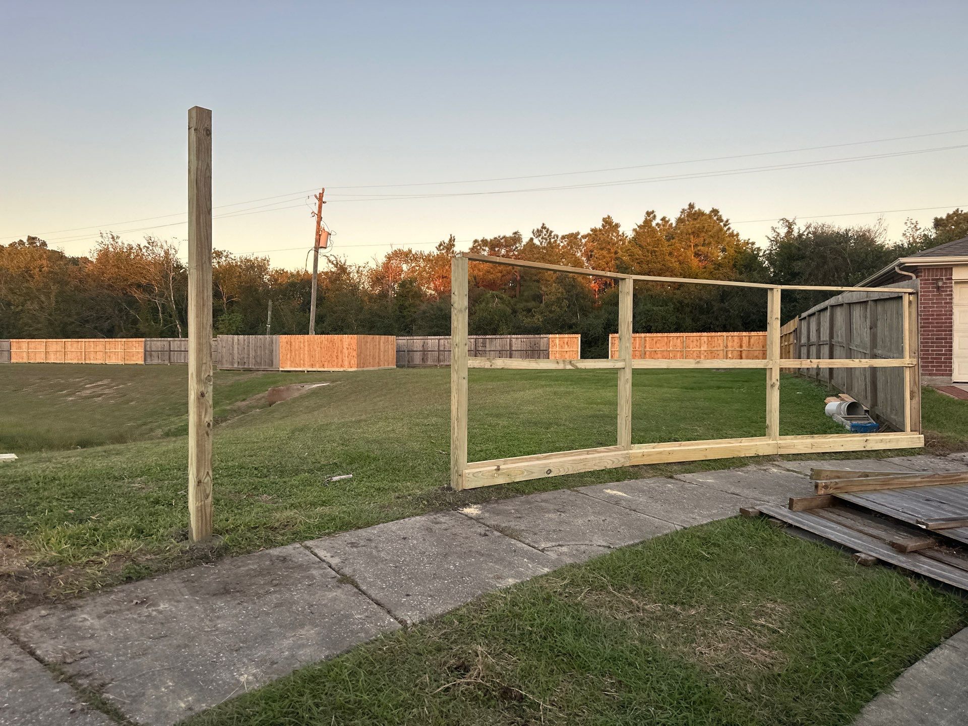 Premium Commercial Fence Installation with Western Red Cedar Pickets, 3 Rails, and Deluxe Wood Gates" by Tim's Fences