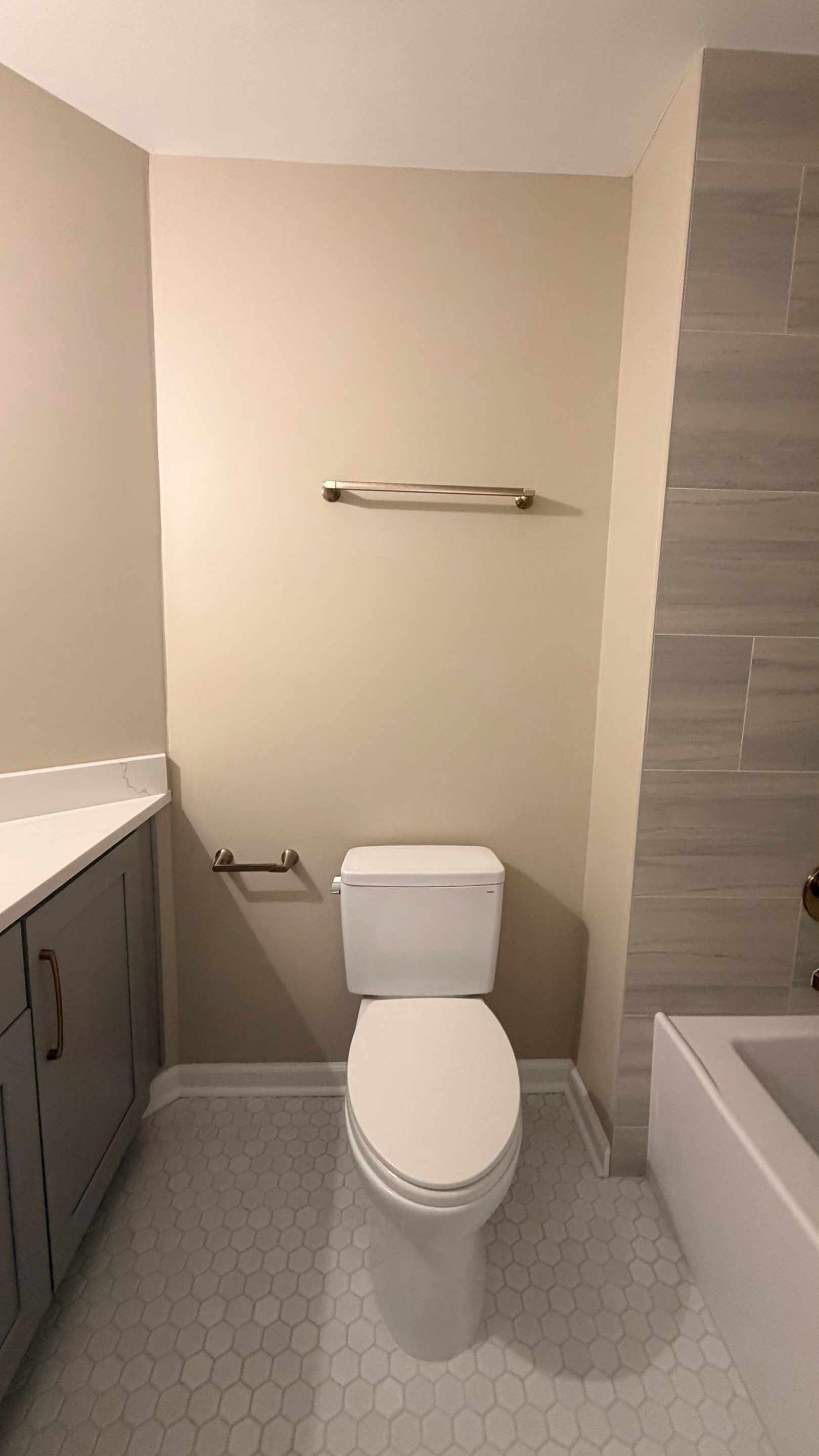 Modern Bathroom Remodel With Quartz Countertops and Hexagonal Tile in Acworth by Swift Home Renovations