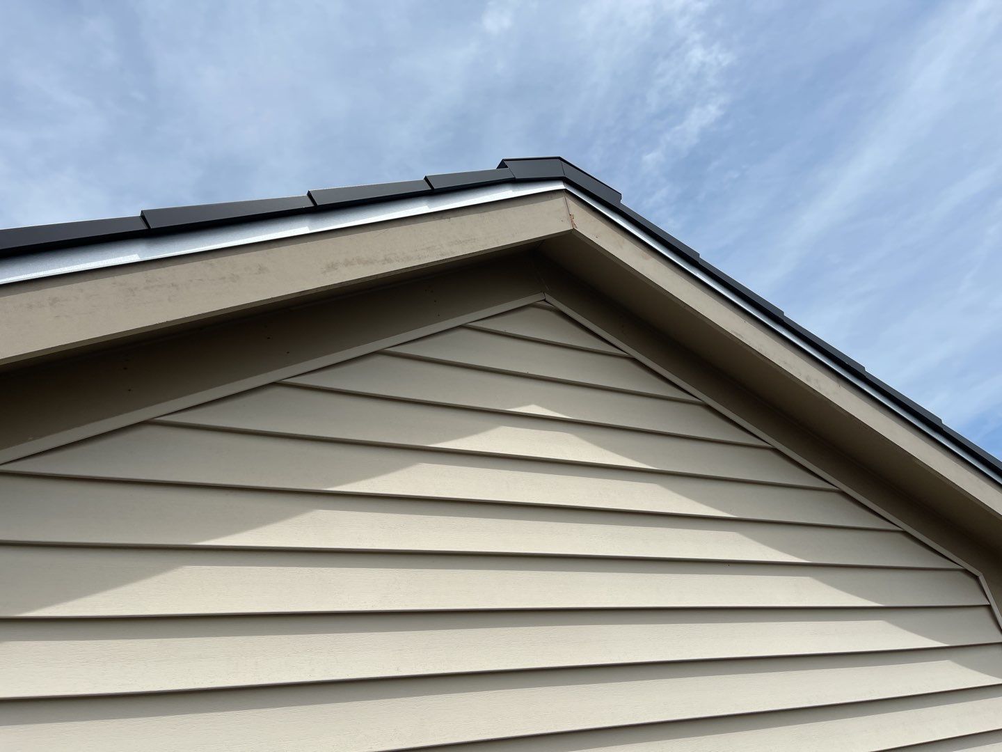 Tesla Solar Roof using Tesla Solar Roof V3 tiles by American Home Contractors