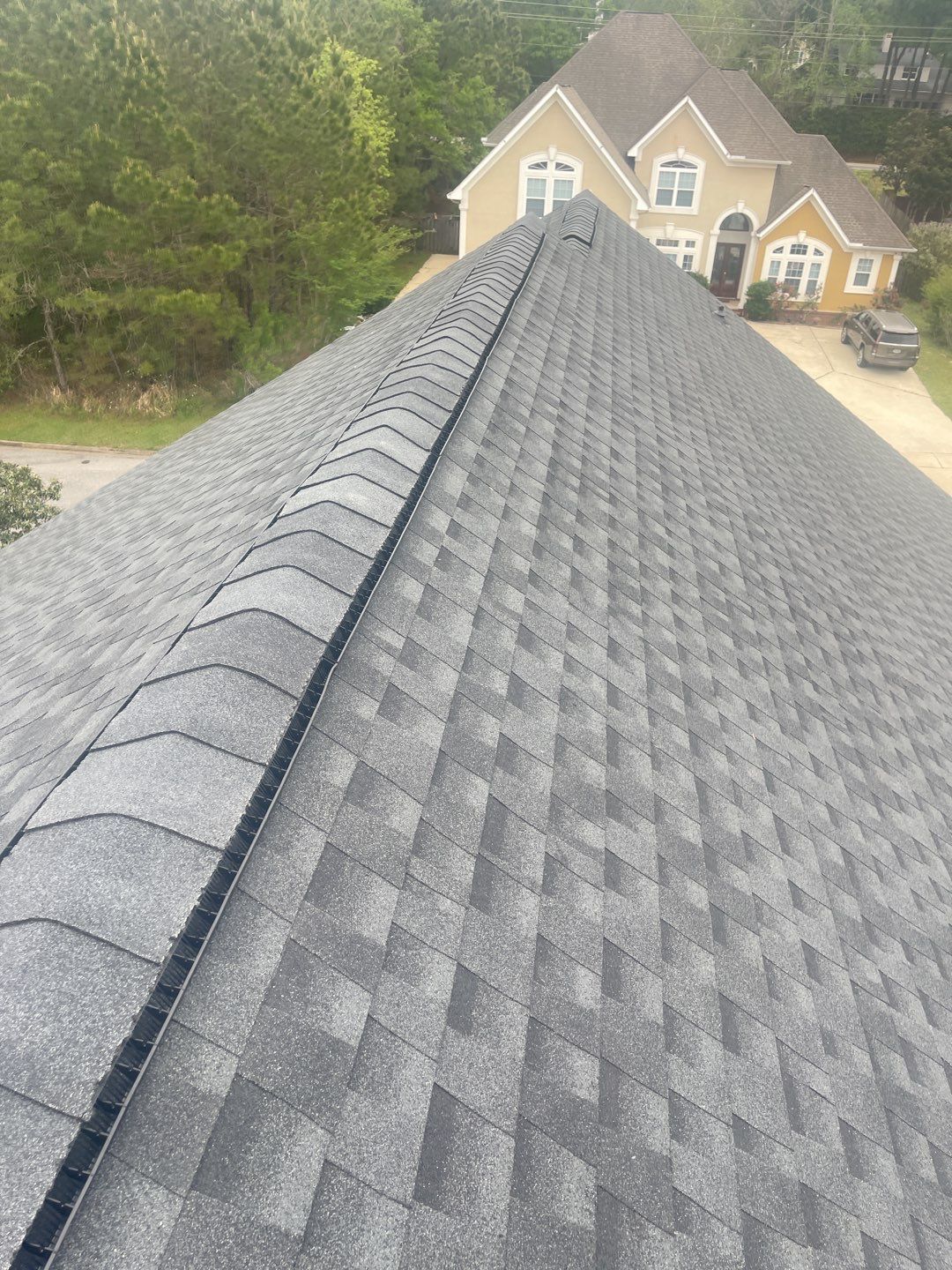 Residential Roofing Installation using Roof Replacement by American Roofing & Construction LLC