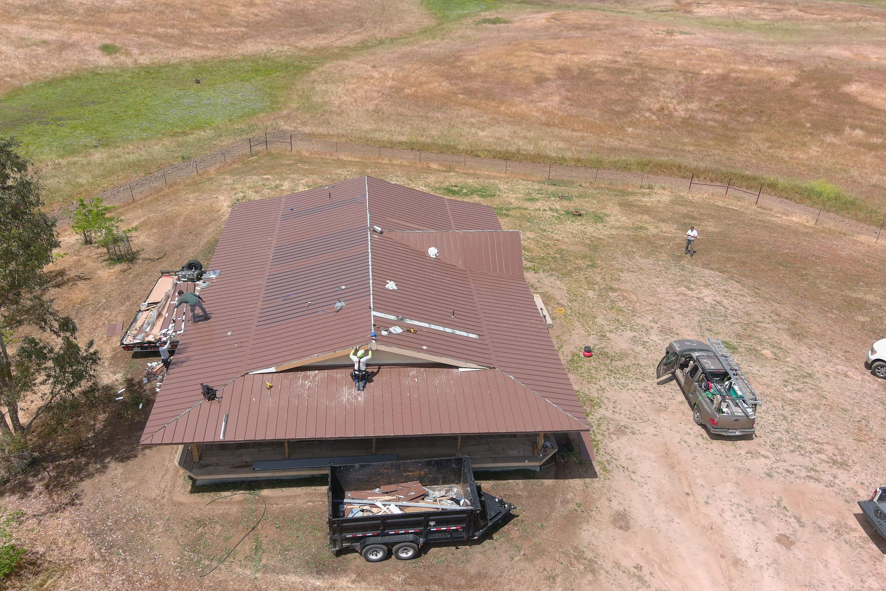 Metal roofing installation using Standing seam metal roofing system by Straight Edge Roofing Inc