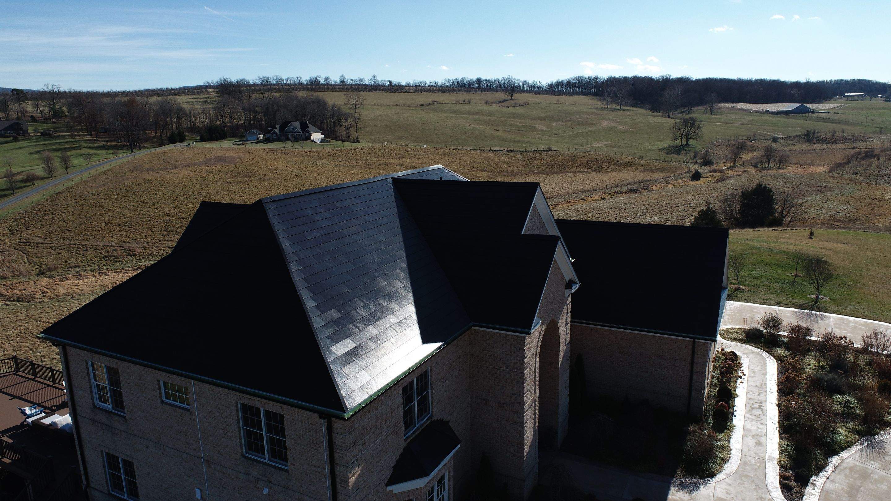 Tesla Solar Roof Replacement  by American Home Contractors