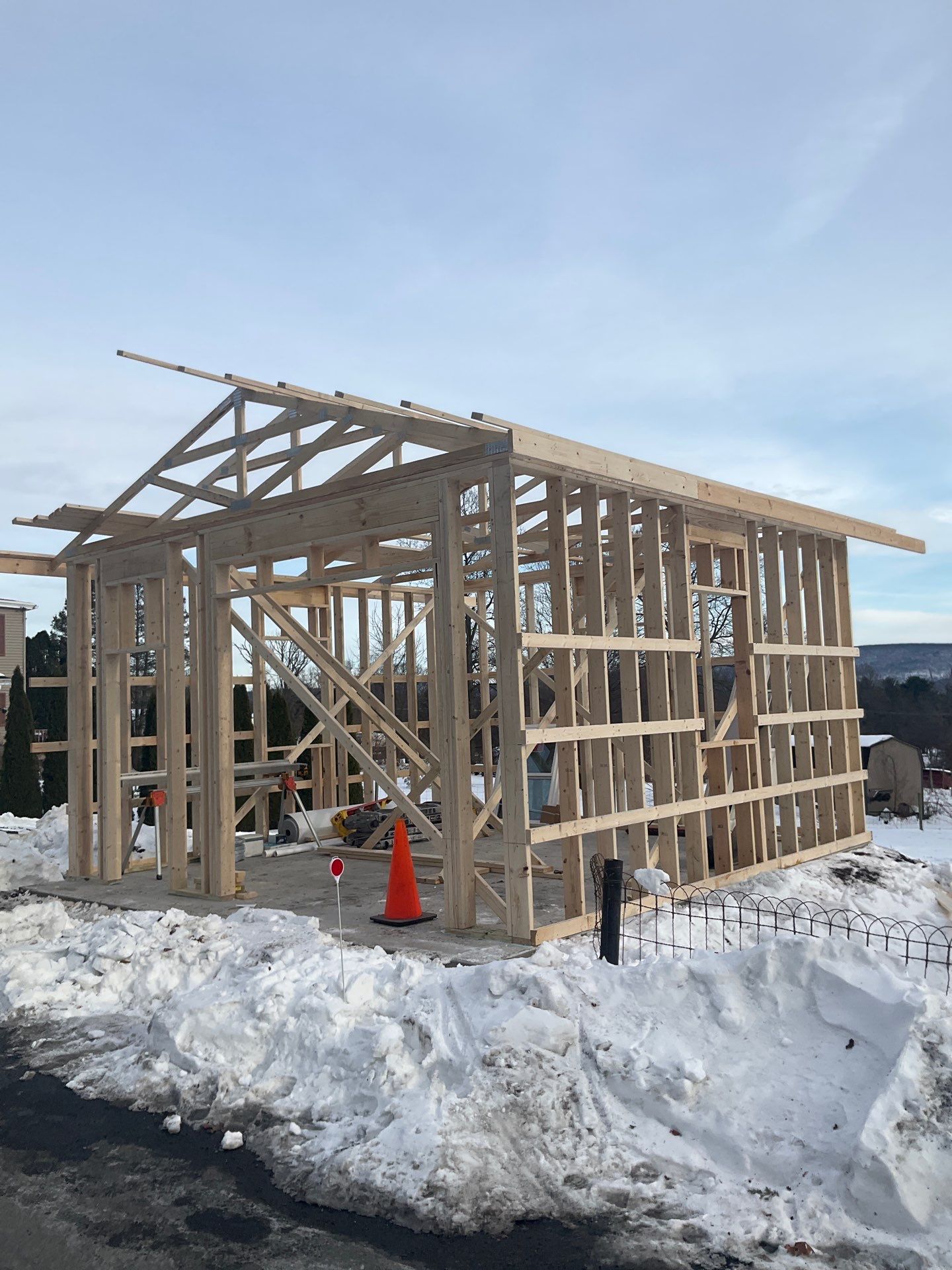 New Red Metal Garage Construction and Residential Window Replacement in Ashland by Esh Builders