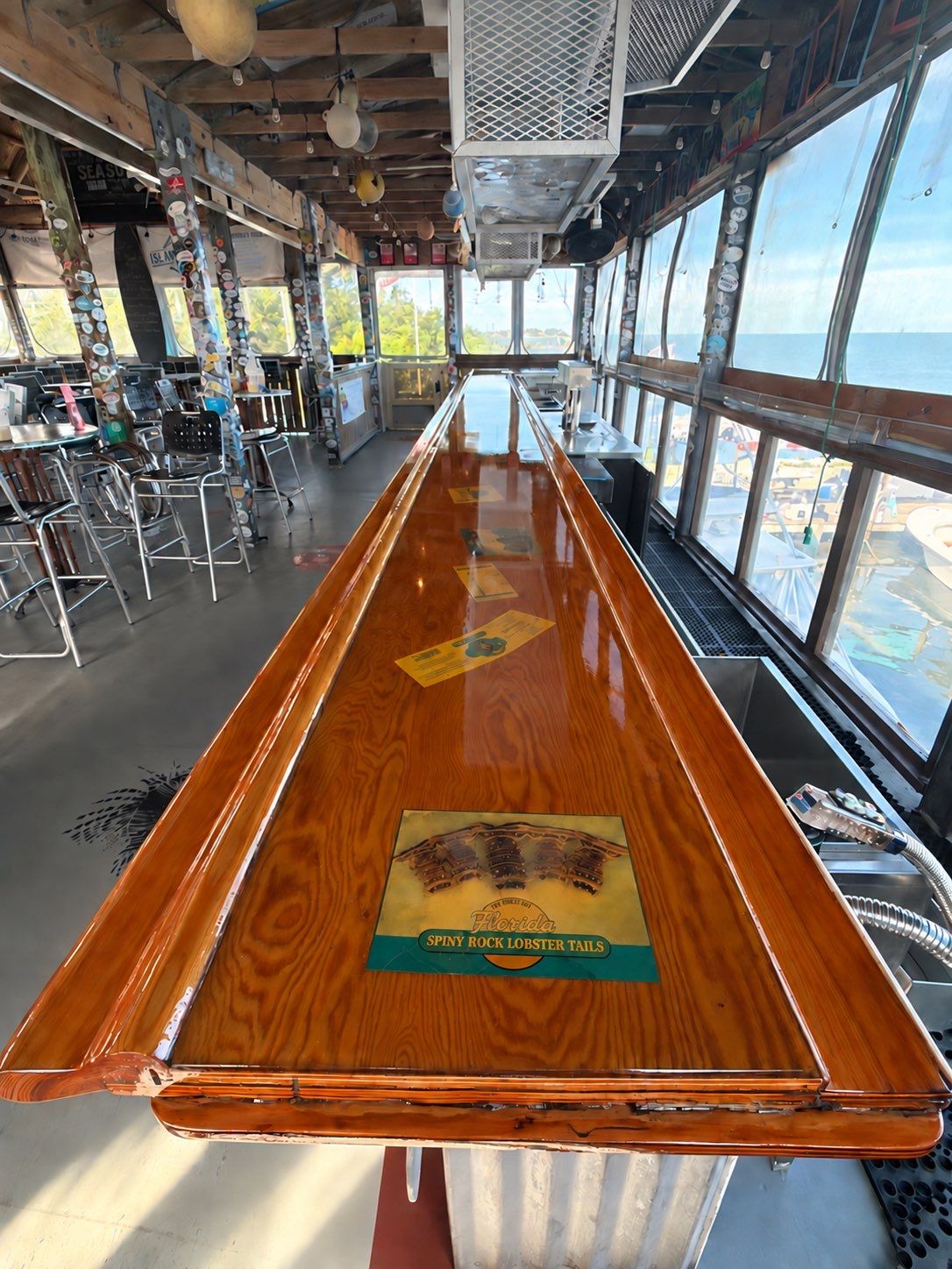 LOCAL FAMOUS FL KEYS BAR REFINISH by Tropical Epoxy Coatings & Creations LLC 