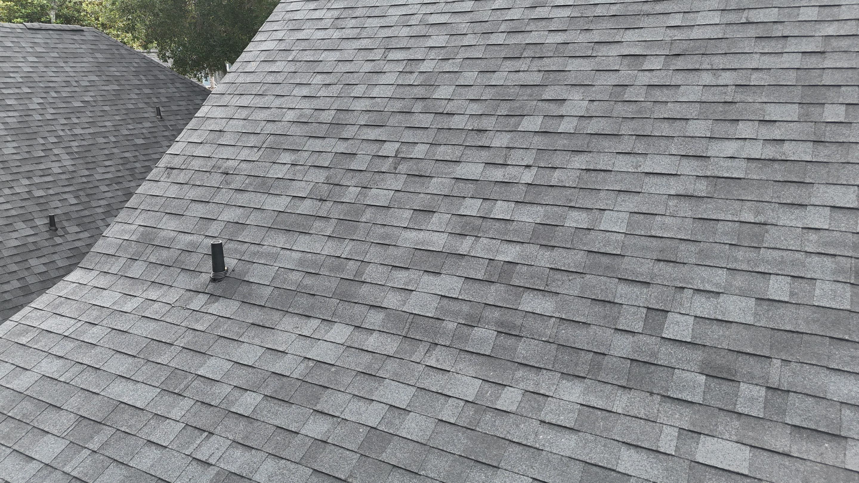 Comprehensive Onyx Black Asphalt Shingle Roof Replacement for Flagler Beach Residence by Trinity Restoration and Roofing LLC