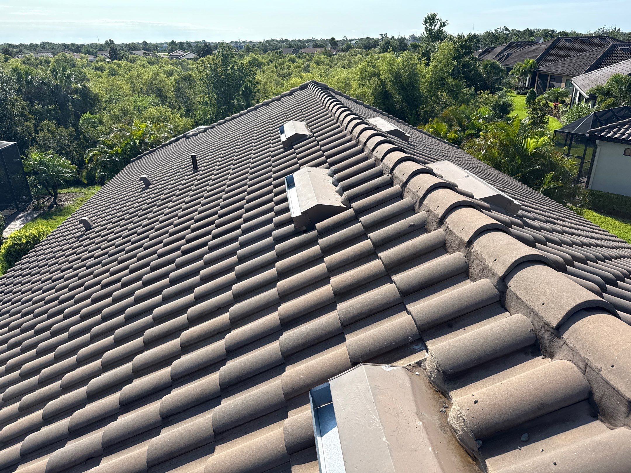 Concrete Tile Roof, Paver Driveway & Lanai Cleaning – Artisan Lakes Esplanade, Palmetto, FL by Sunshine AquaWash