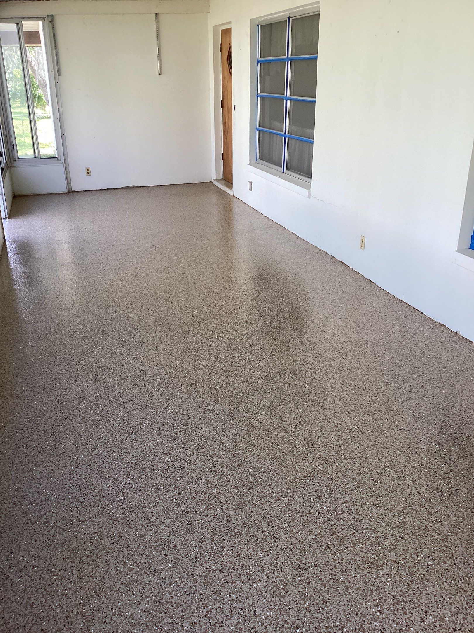 Patio using Pebble Beach by Amvet concrete coatings llc
